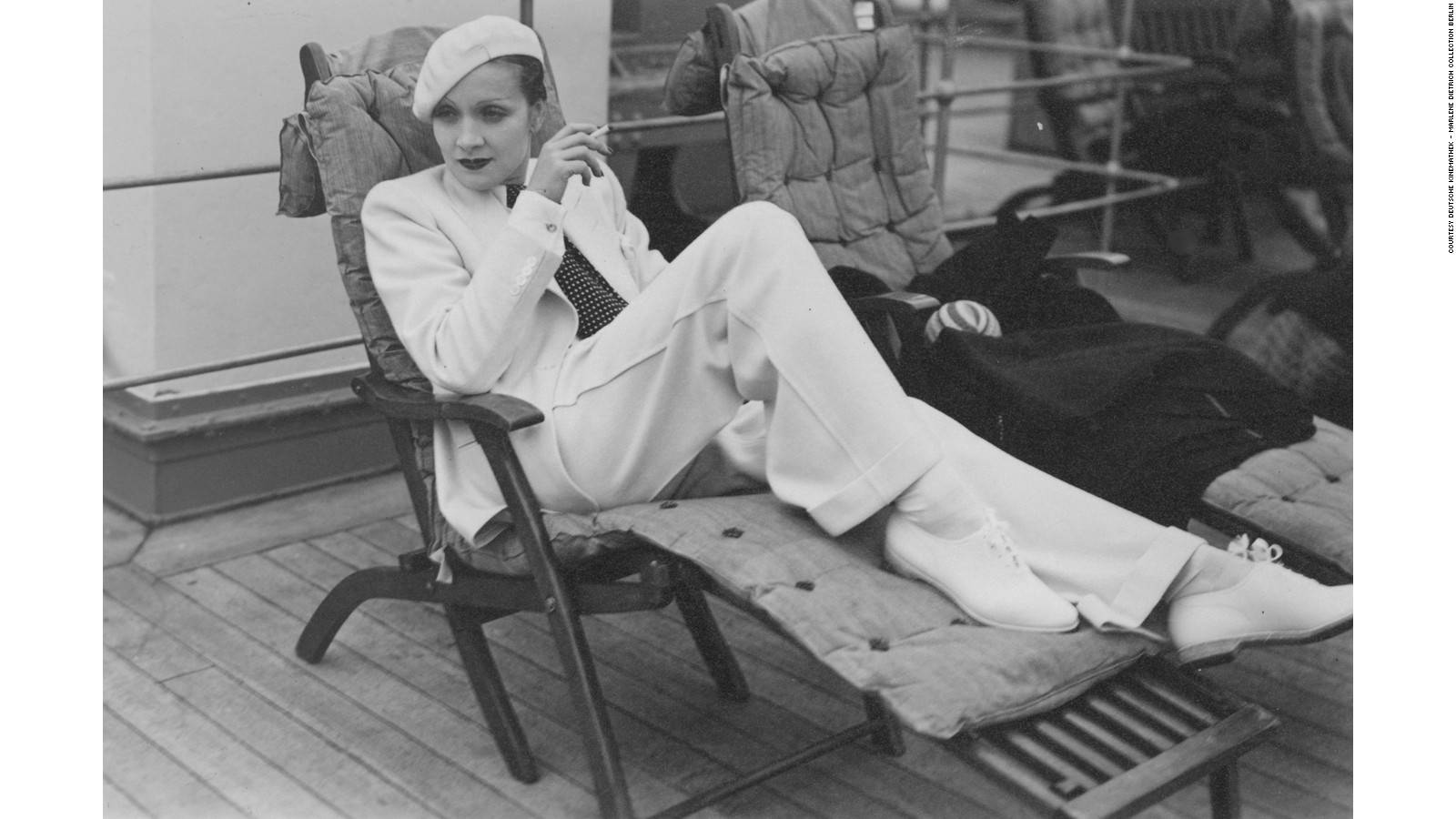 Marlene Dietrich On Beach Chair Background