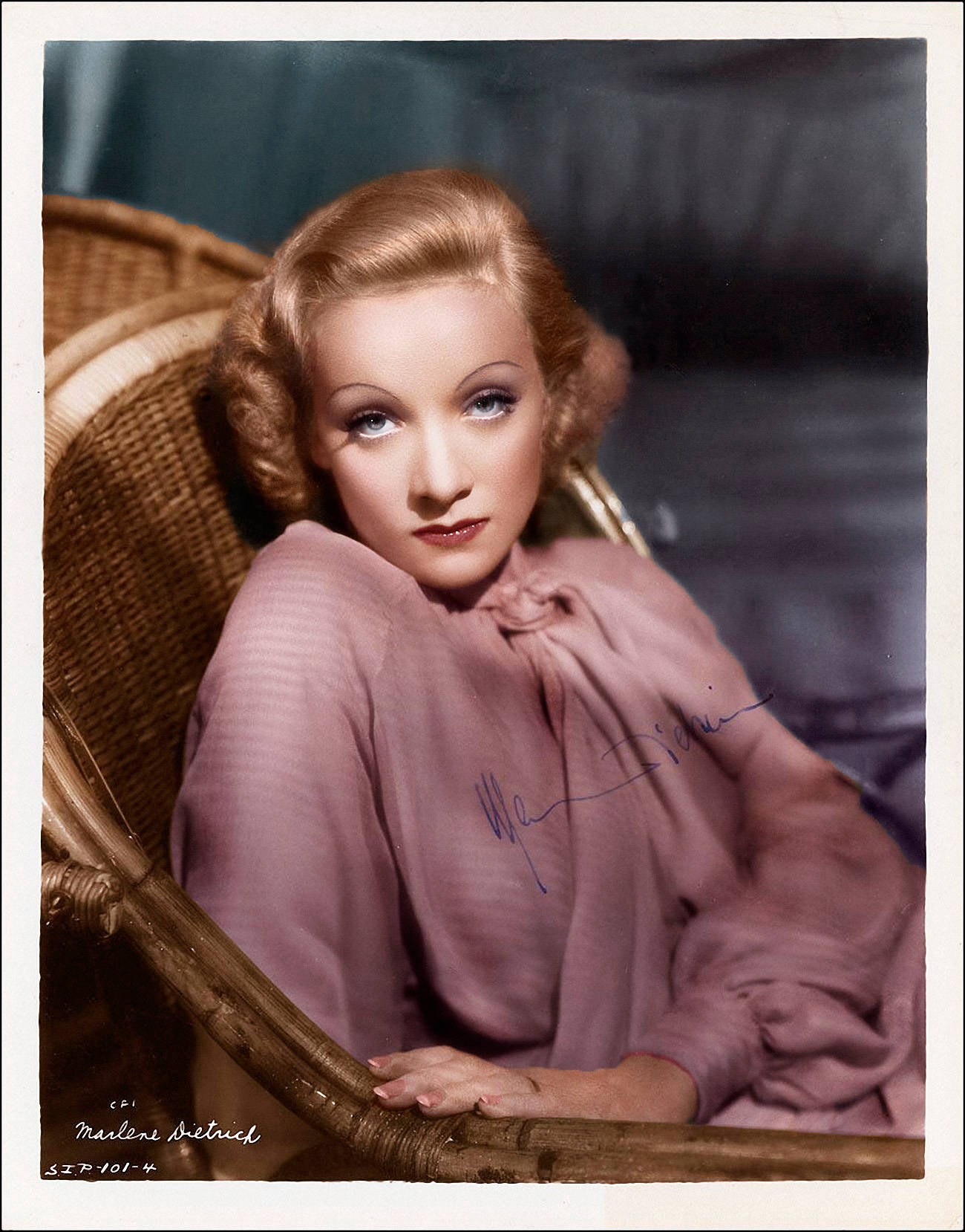 Marlene Dietrich On Rattan Chair Colored Background