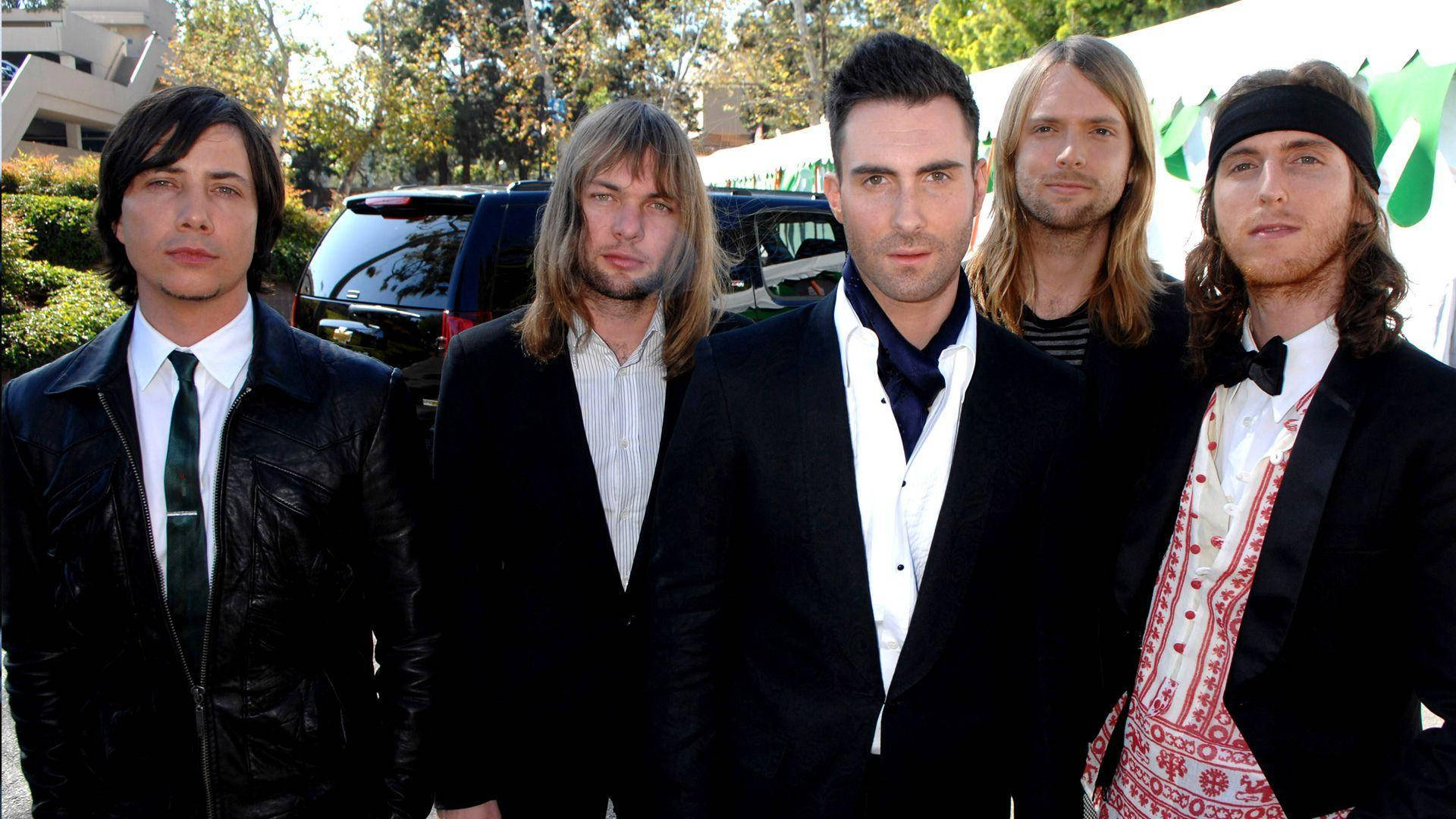 Maroon 5 Tuxedos Parking Lot Background