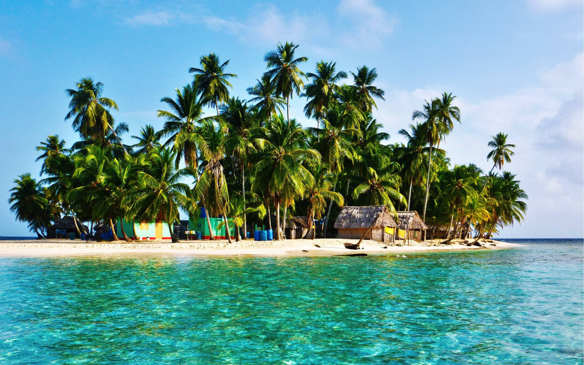 Marshall Islands Beach With Huts And Trees Background