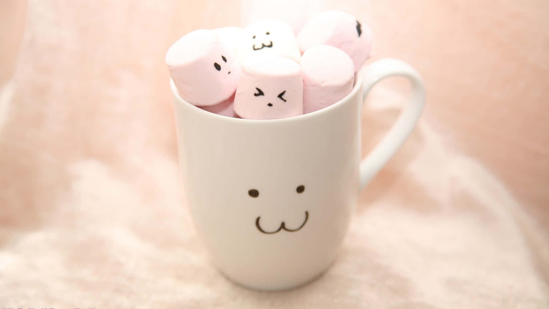 Marshmallows In A Cup With Faces On Them