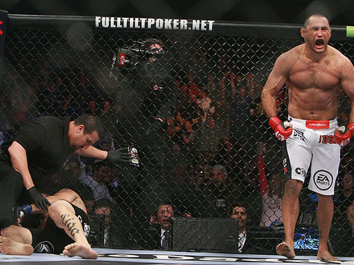 Martial Artist Dan Henderson Winning Moment Background