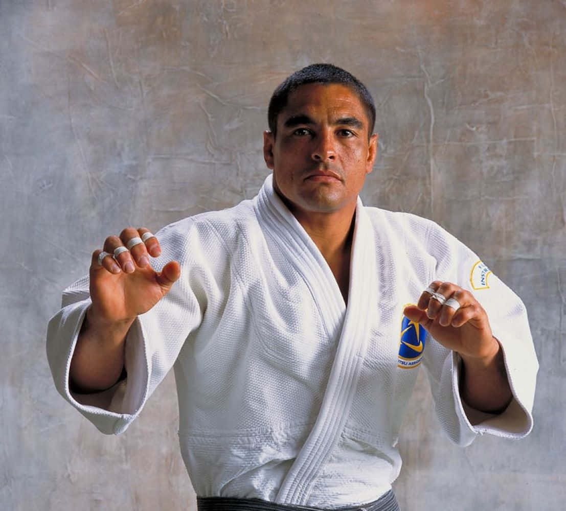 Martial_ Artist_in_ Gi_ Stance Background