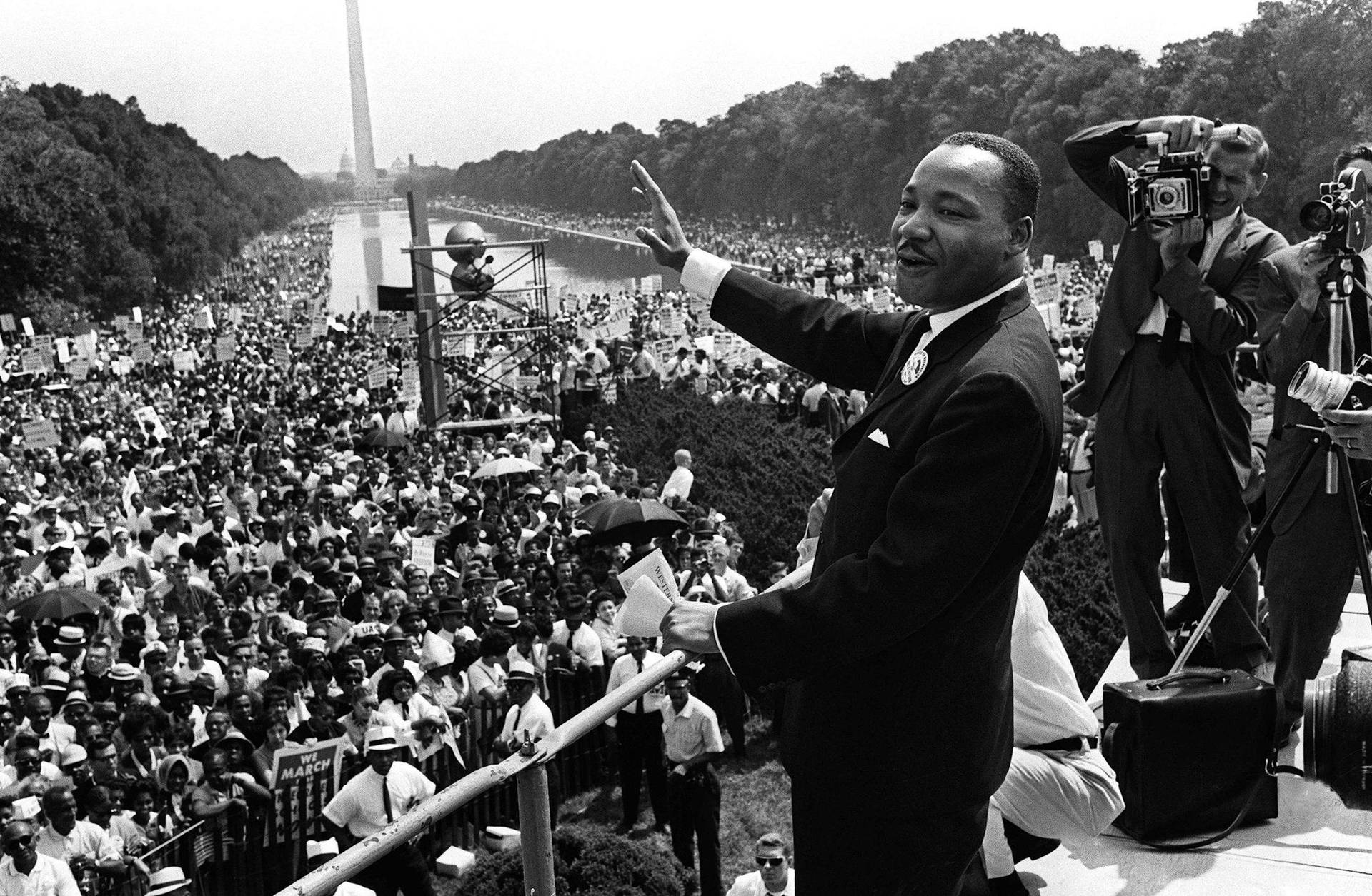 Martin Luther King Jr With Crowd At Washington Dc Background