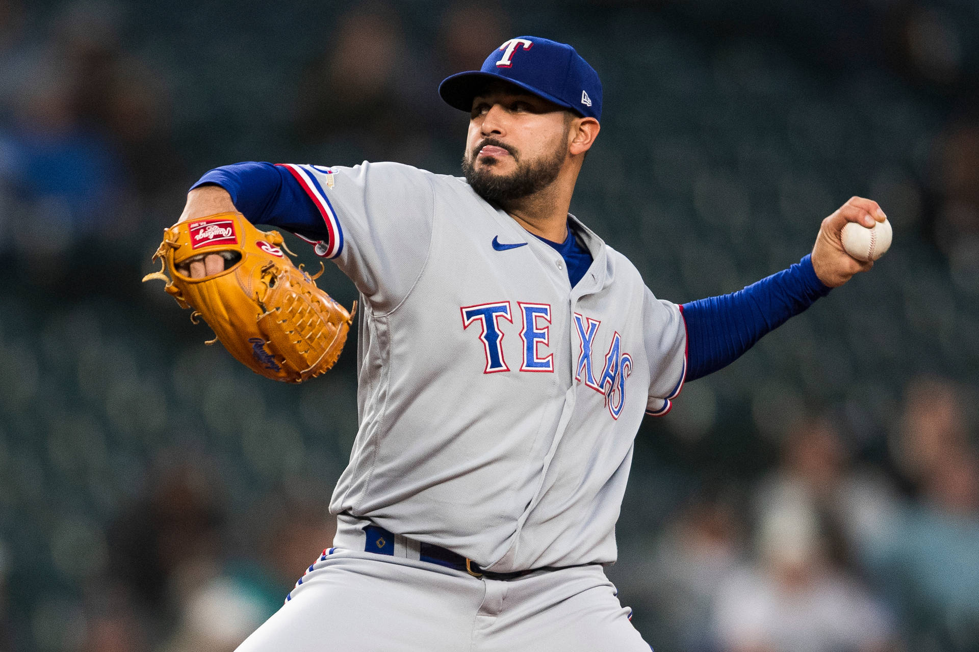 Martin Perez Aiming To Throw Ball Background