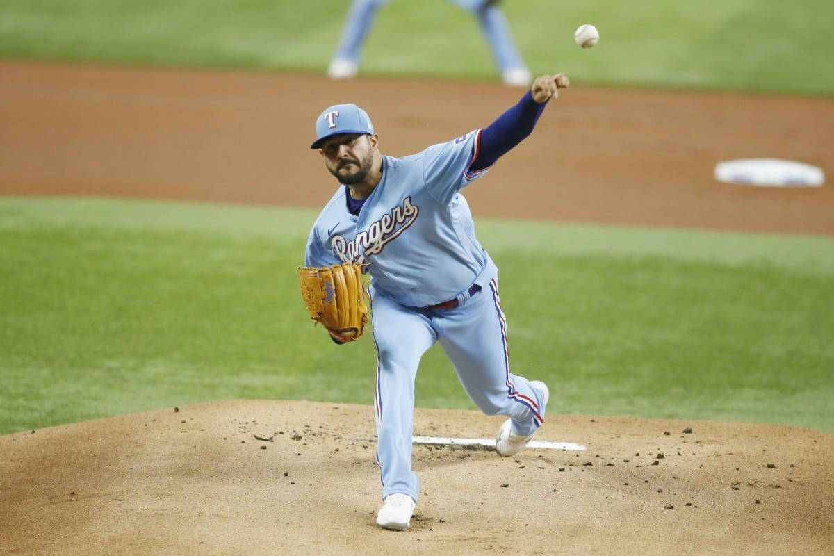 Martin Perez And Thrown Baseball Background