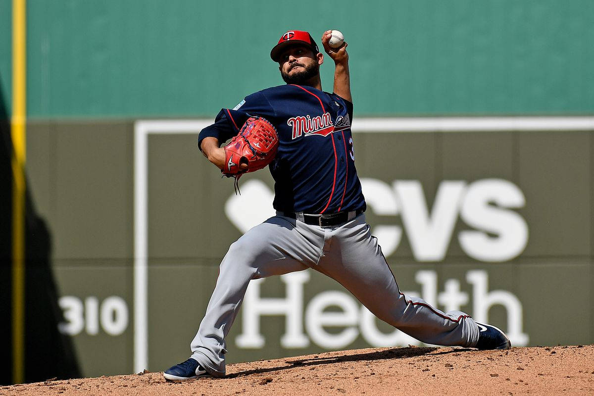 Martin Perez Playing For Minnesota Twins Background