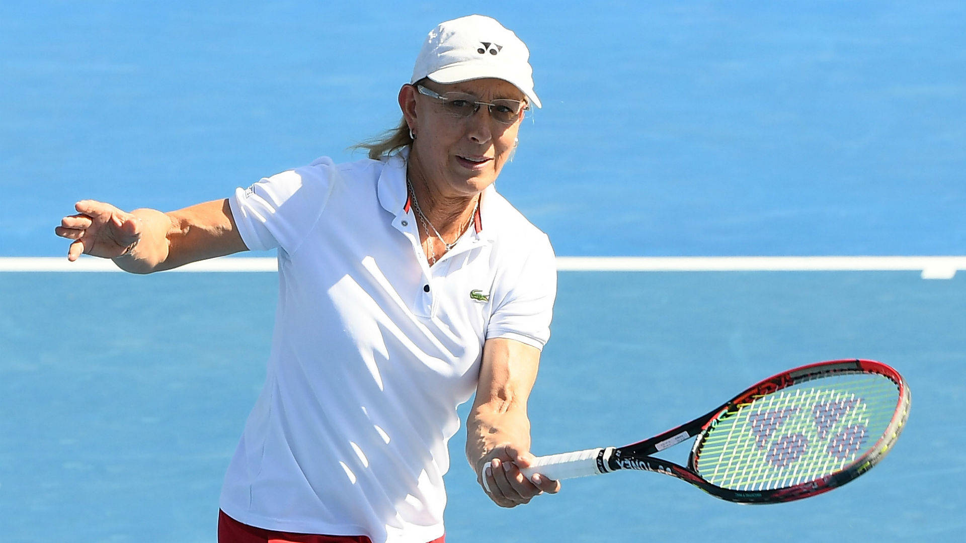 Martina Navratilova Holding Her Racket Background