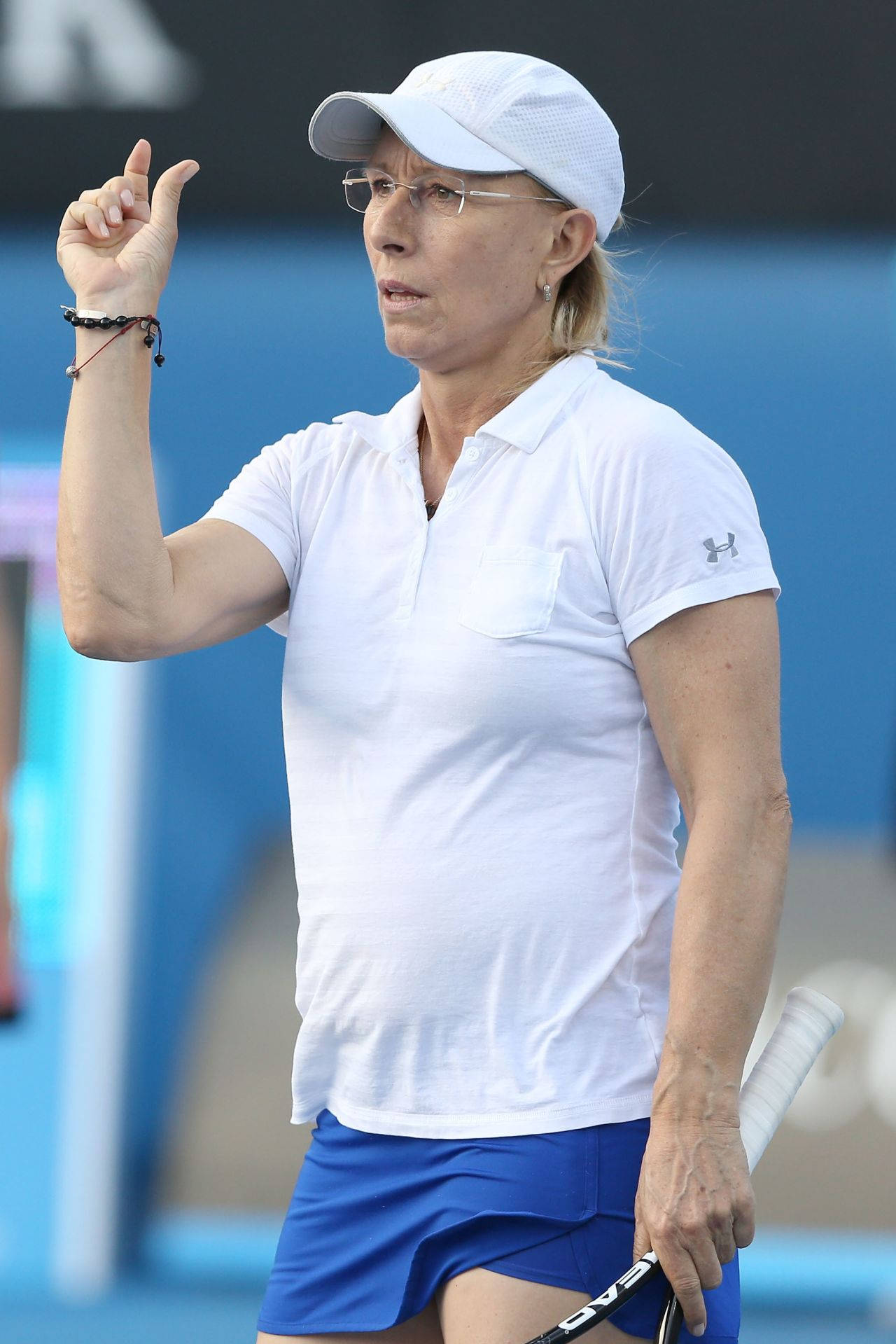 Martina Navratilova Passionately Gesturing During A Game Background