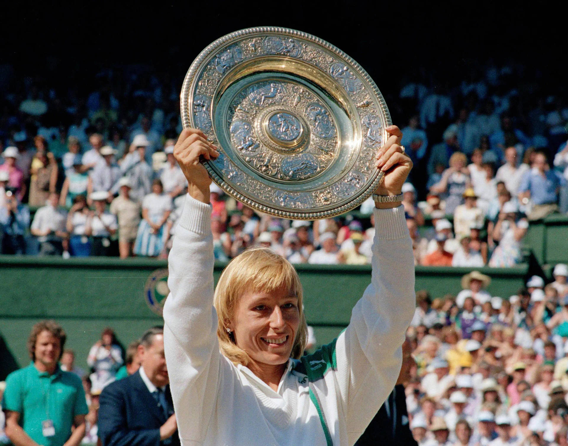 Martina Navratilova Raising Her Trophy Background