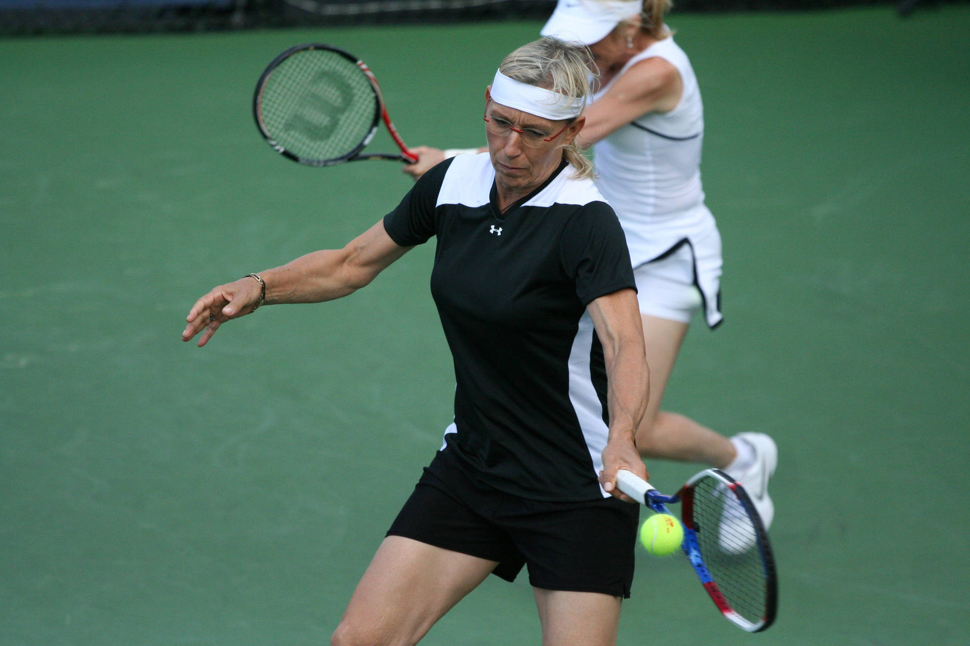 Martina Navratilova Wearing Black Background