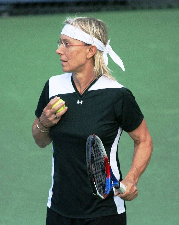 Martina Navratilova Wearing White Headband Background