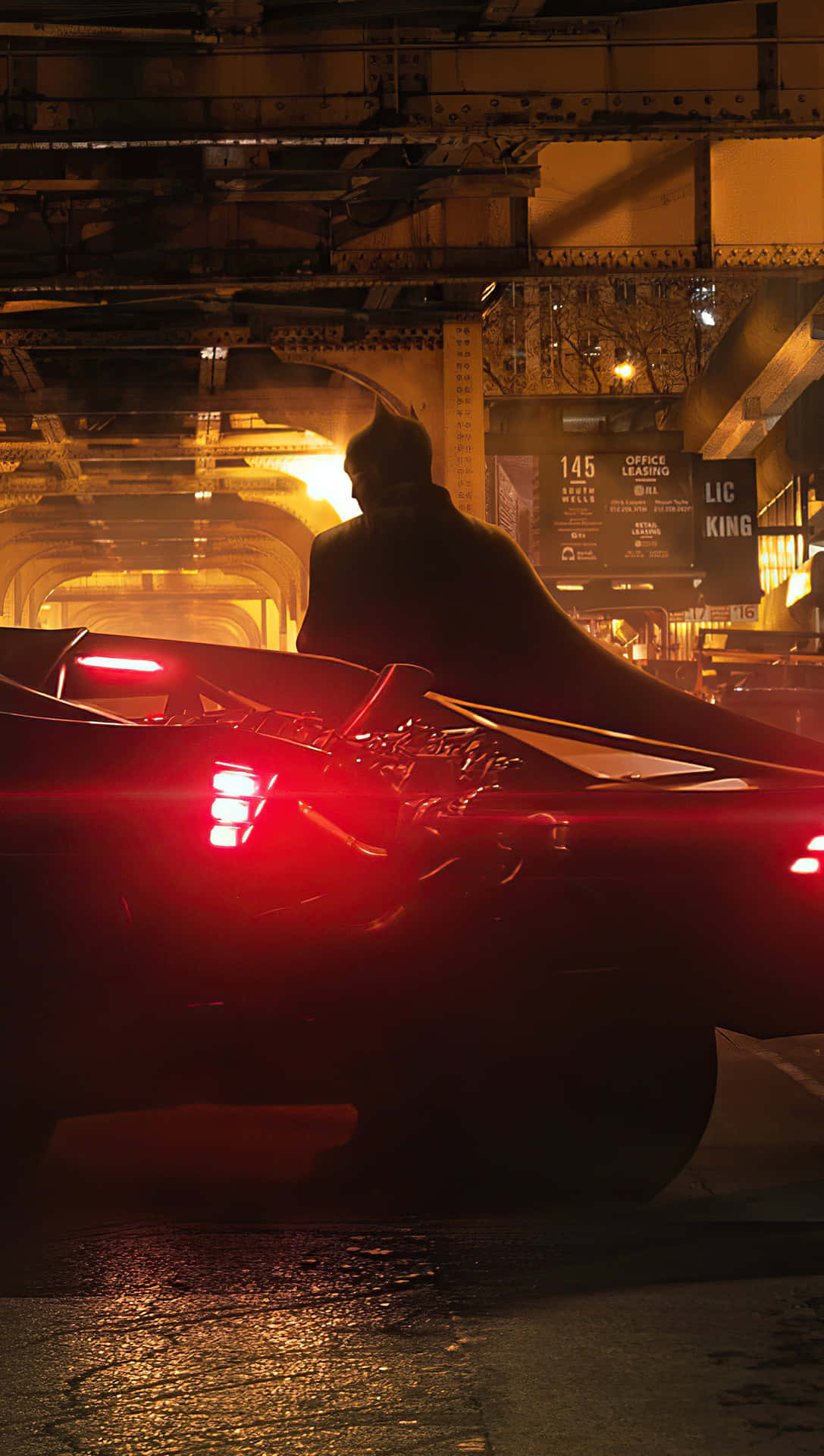 Marvel At The Sprawling Batman City Skyline At Night Background