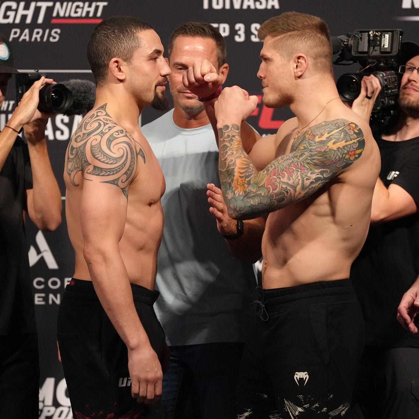 Marvin Vettori And Robert Whittaker Staredown Background