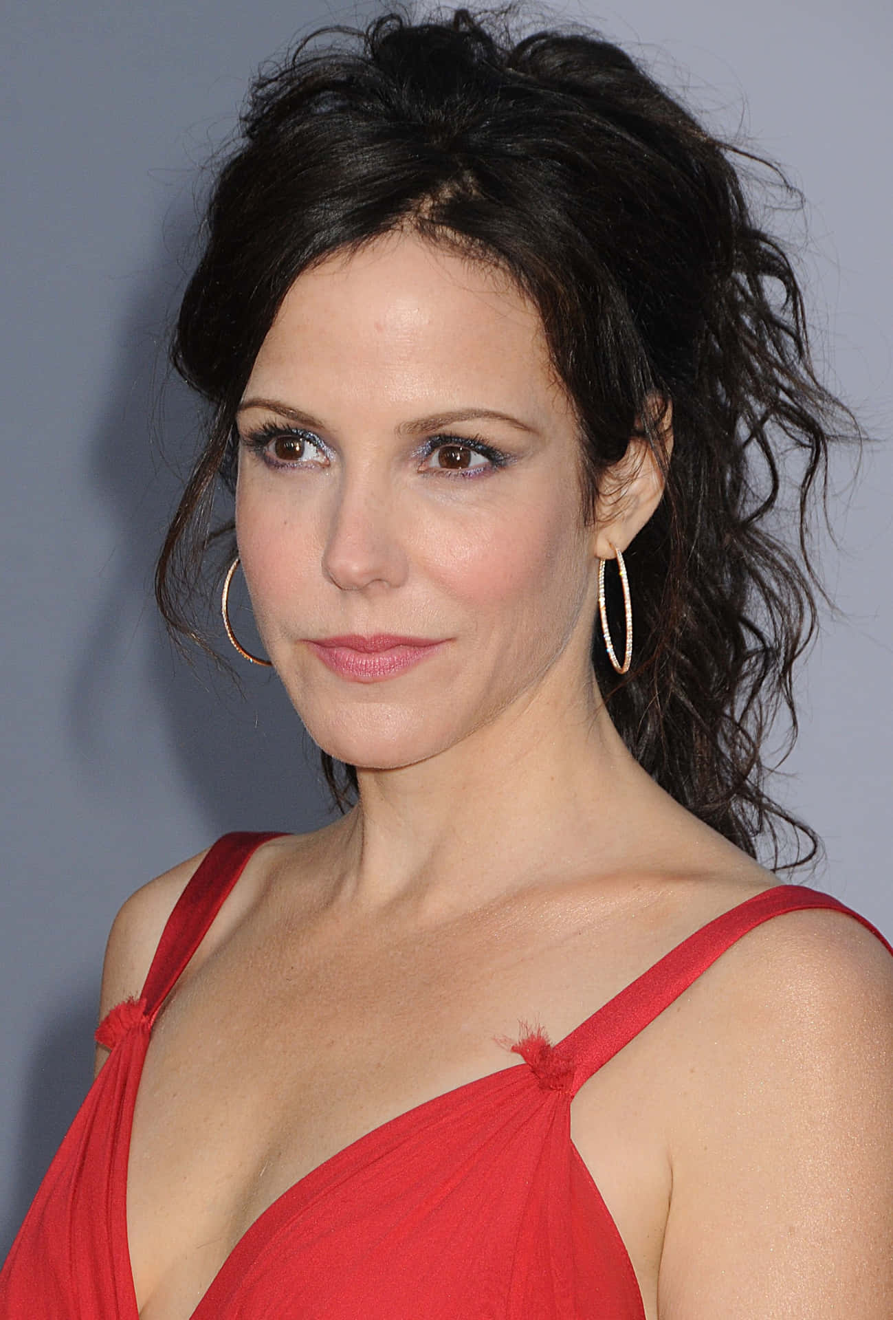 Mary Louise Parker On Red Staircase Background