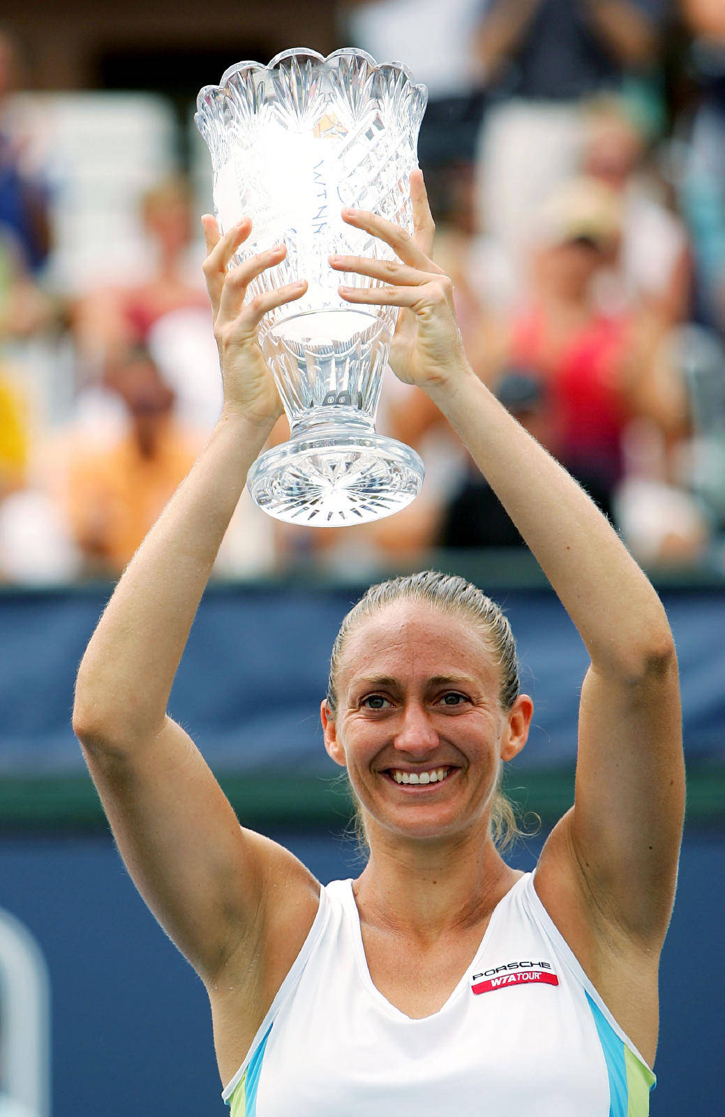 Mary Pierce Raising Glass Trophy Background