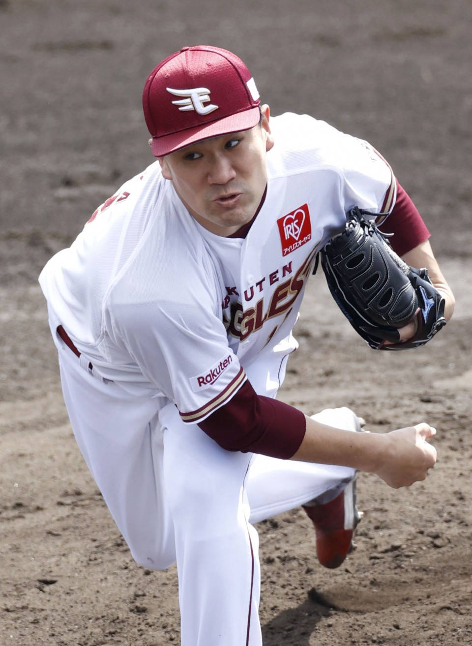 Masahiro Tanaka Leaning Forward Throw Background