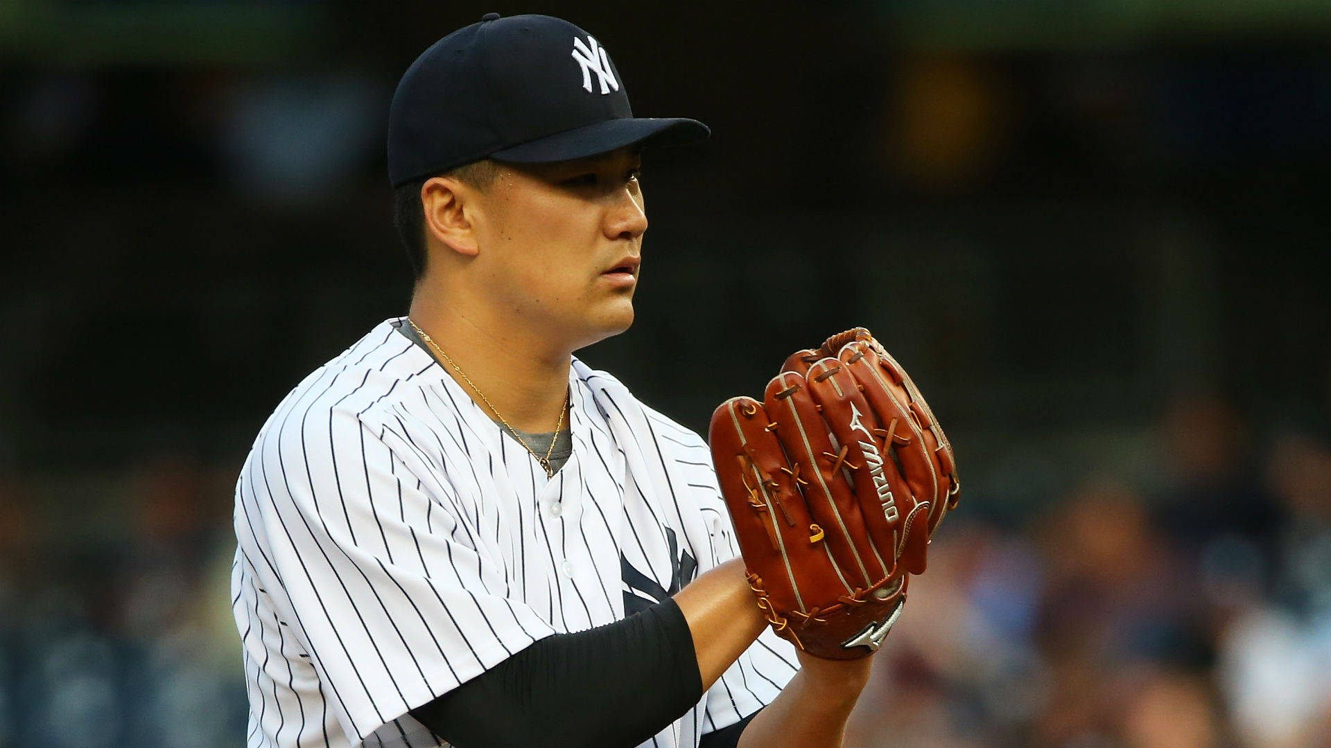 Masahiro Tanaka Wearing Brown Leather Gloves Background