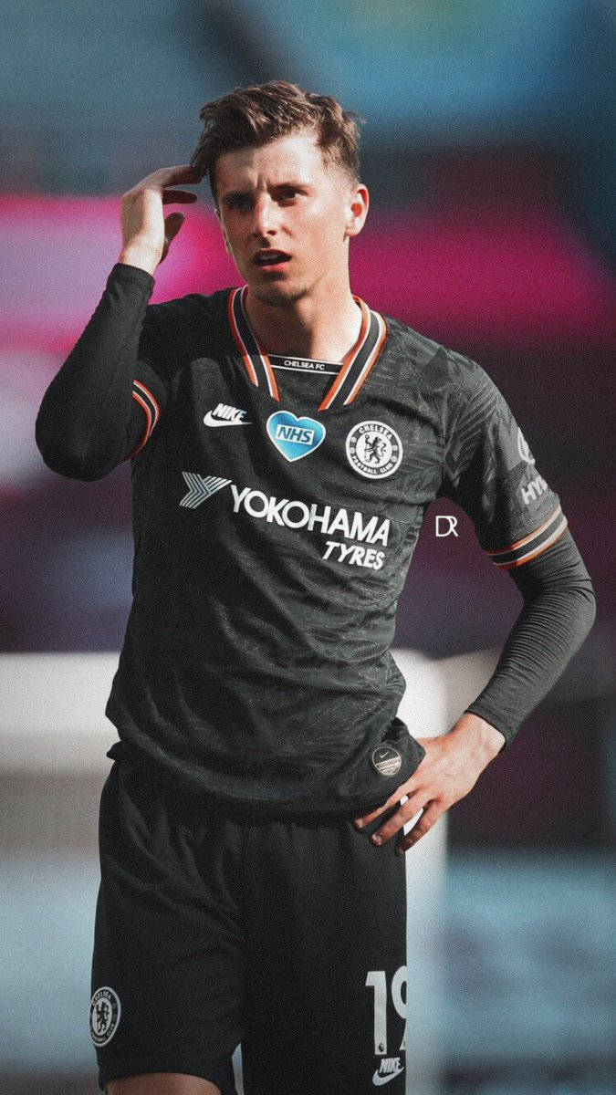 Mason Mount In A Black Uniform Background