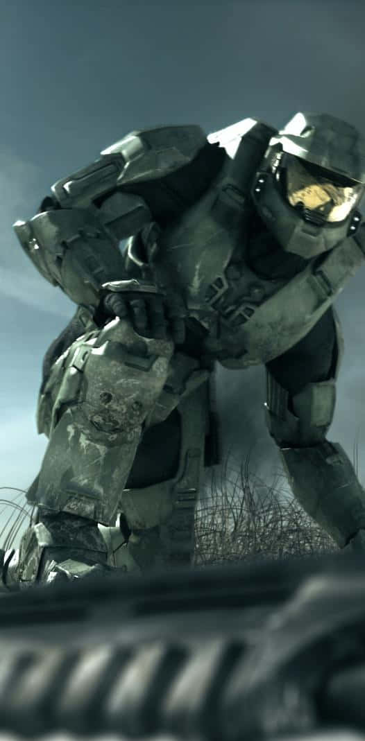 Master Chief And His Trusty Phone Background