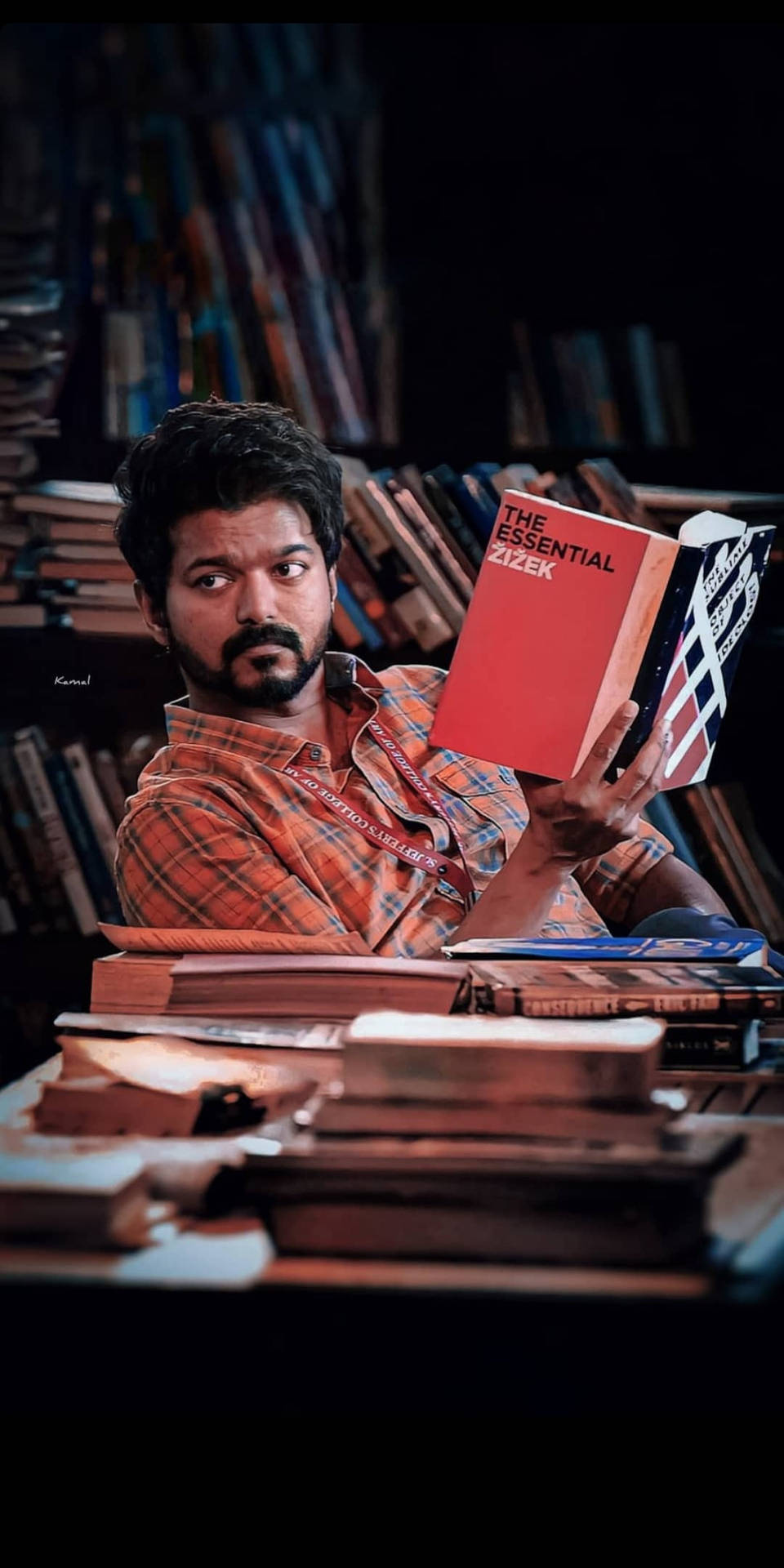 Master Vijay Hd With A Book Background