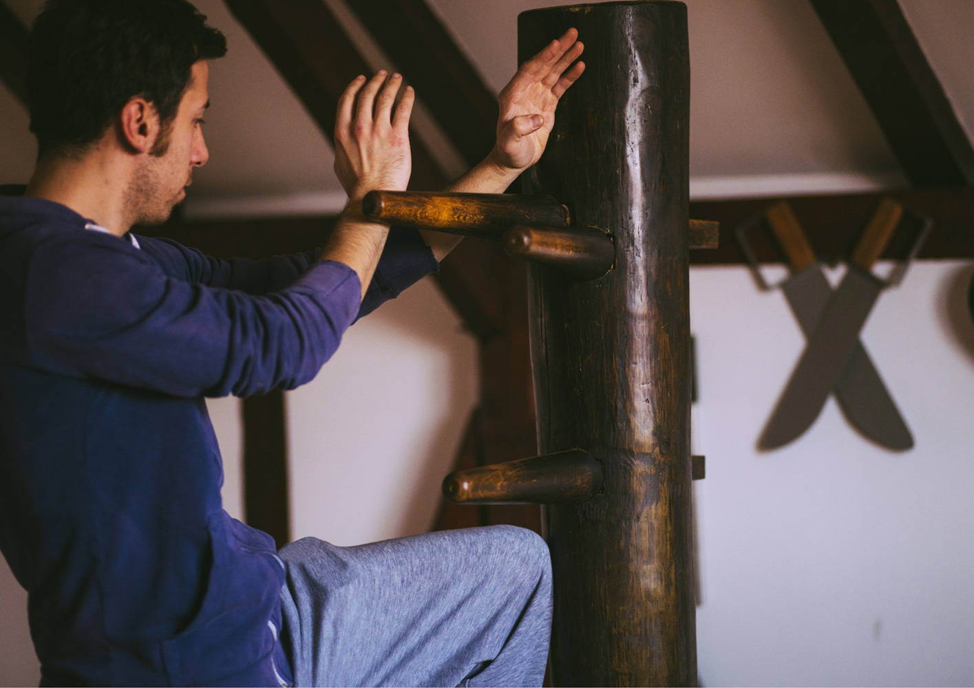 Mastering Wing Chun Through Dummy Practice Background