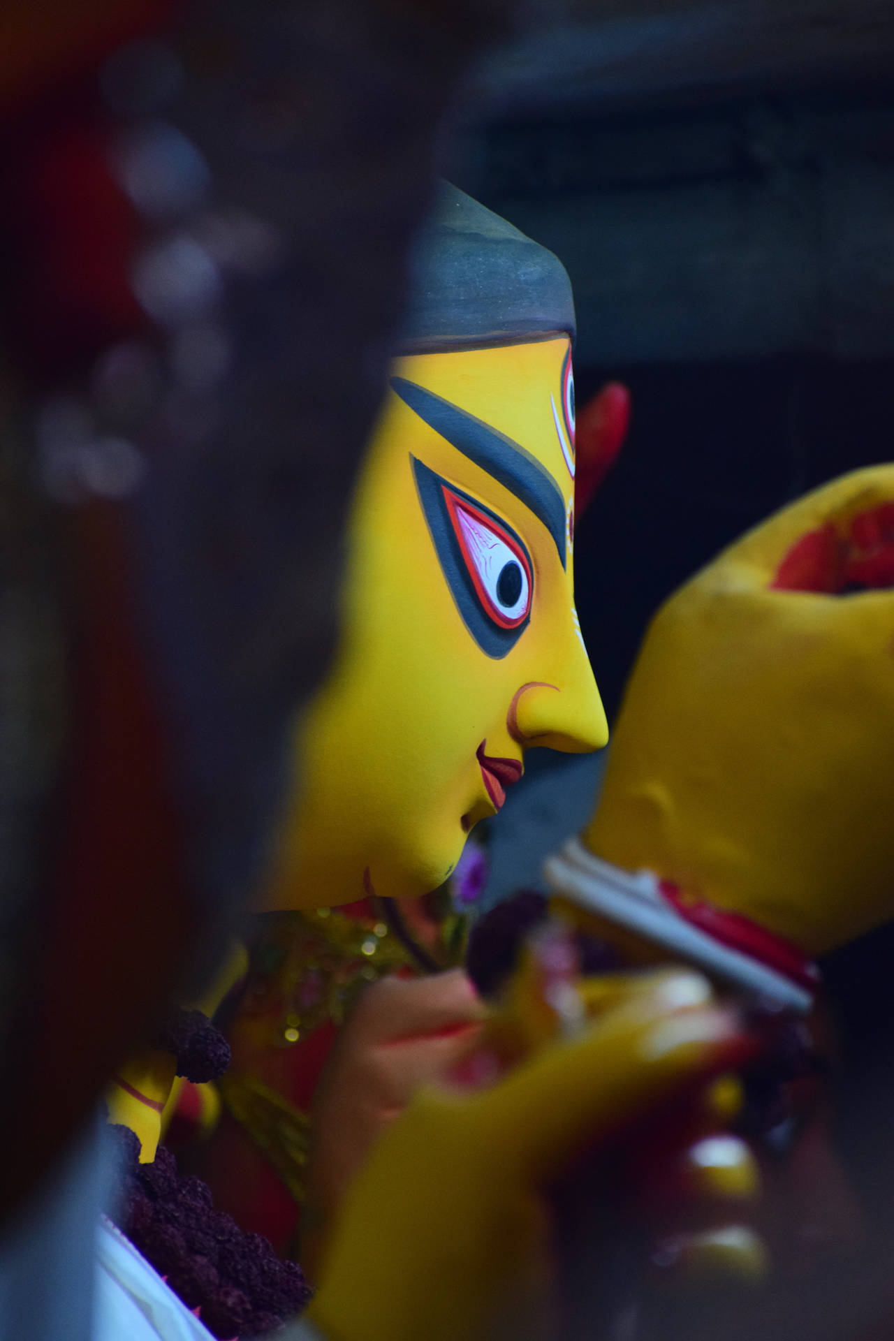 Mata Rani Face In Yellow Background