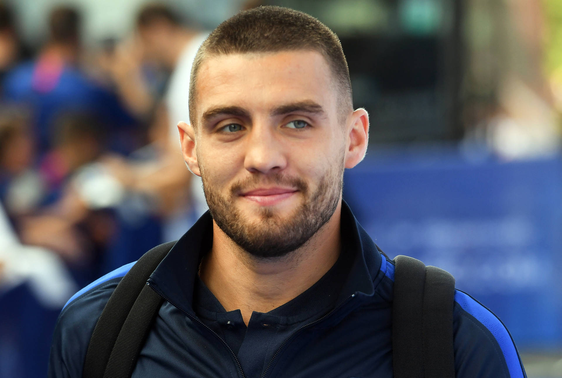 Mateo Kovacic Backpack Smirk Background