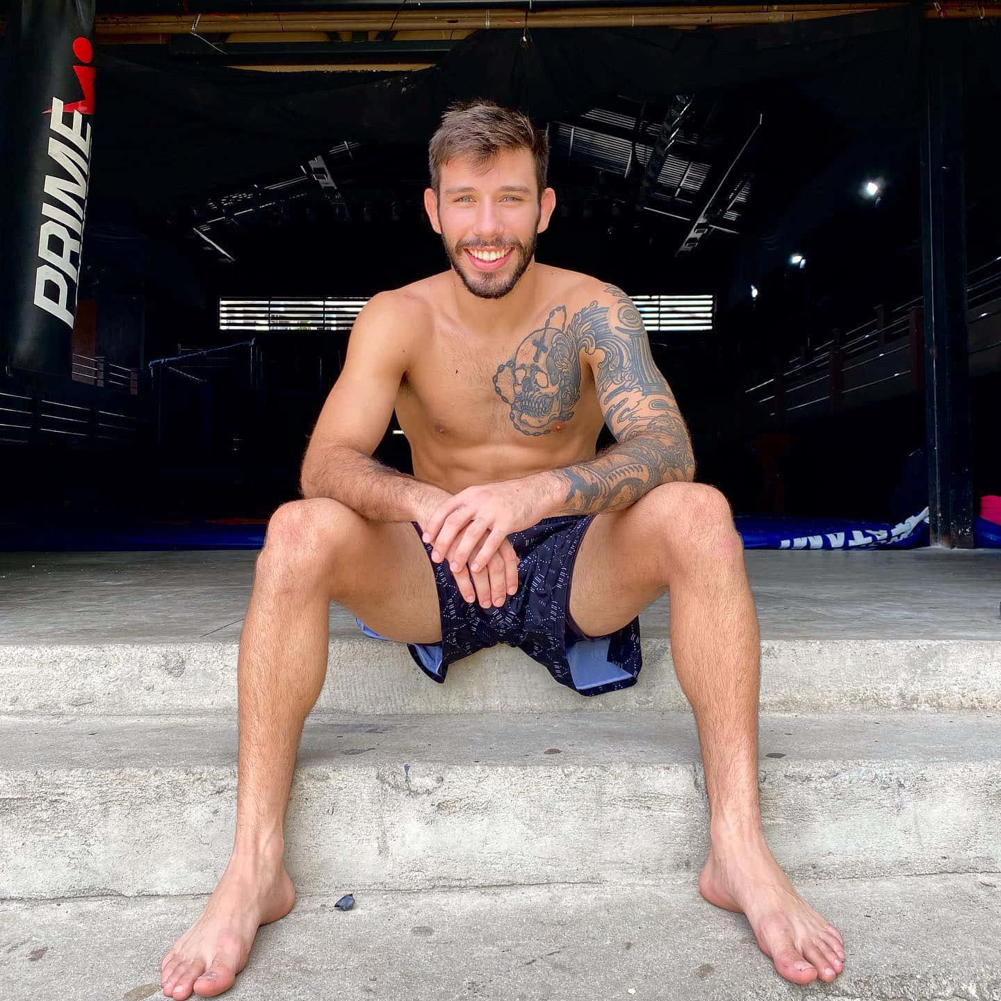 Matheus Nicolau Sitting On Concrete Stairs