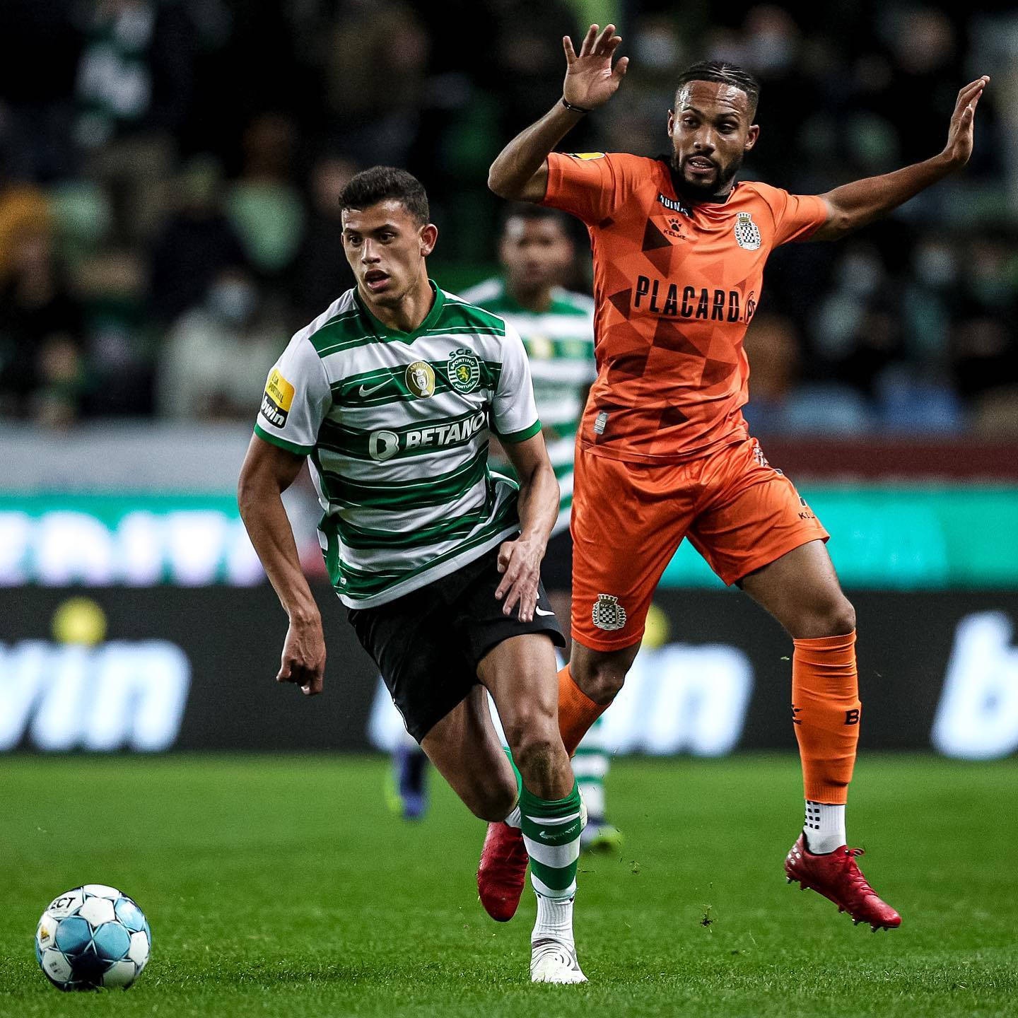 Matheus Nunes In Action During A Football Match Background