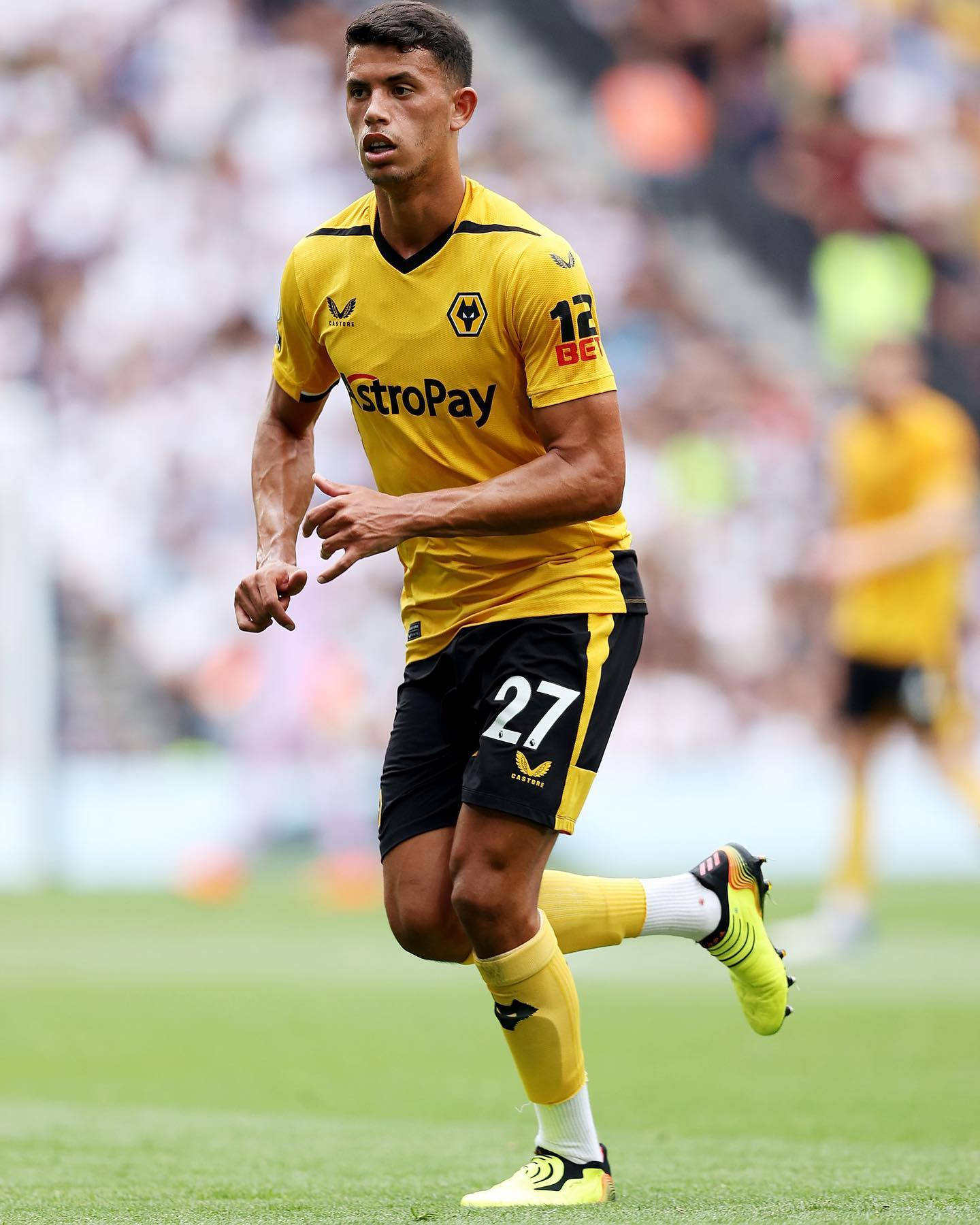 Matheus Nunes In Action In Yellow And Black Uniform