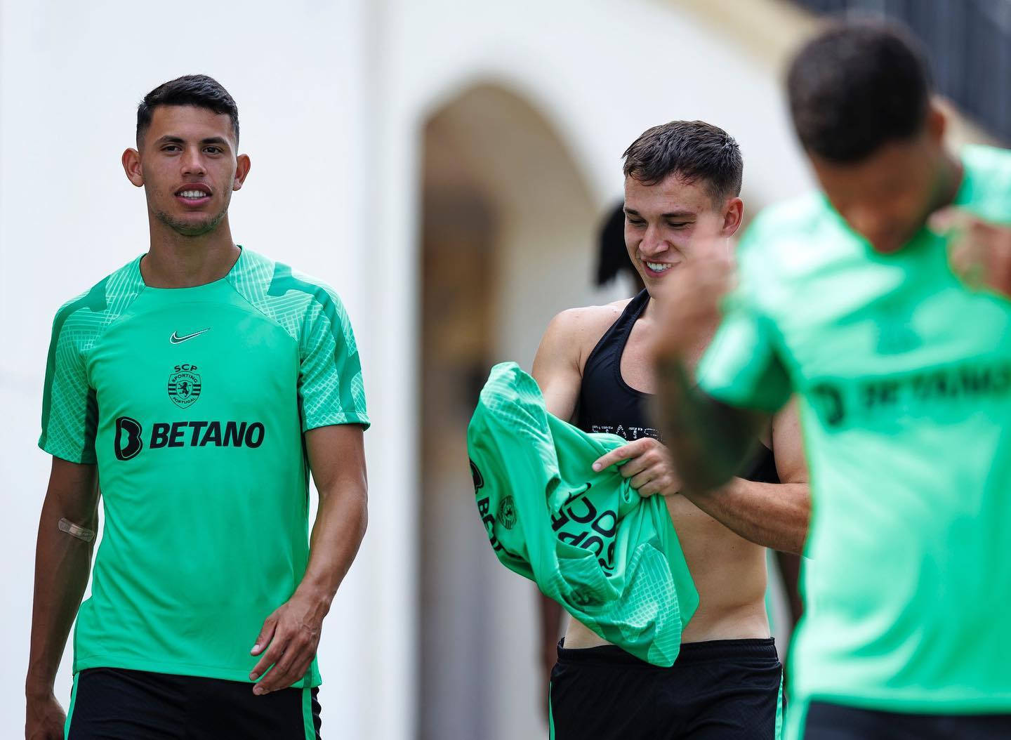 Matheus Nunes Walking With Teammates Background