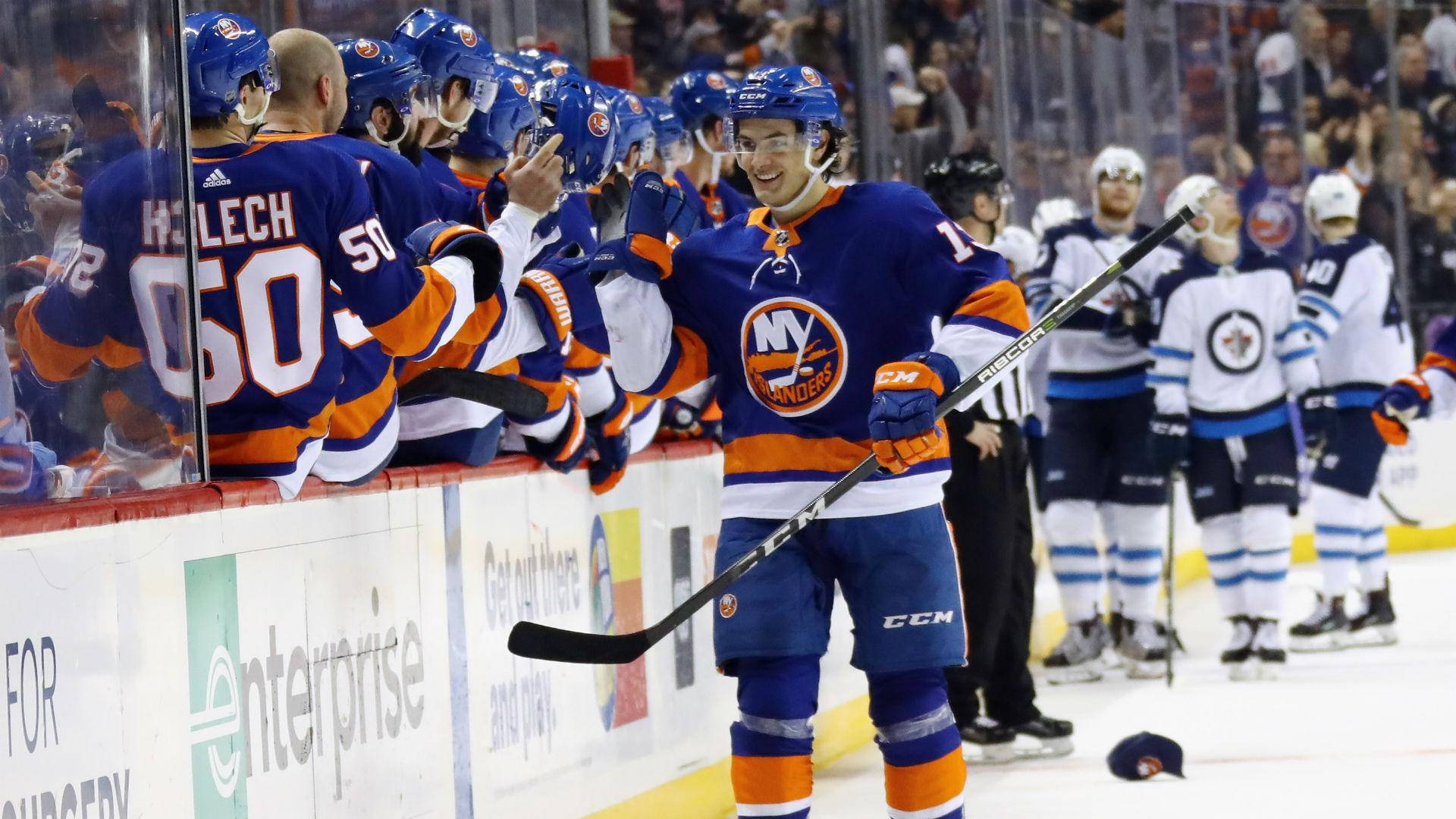 Mathew Barzal, Top Canadian Ice Hockey Player, Celebrating With His Teammates.