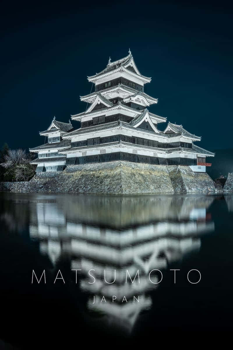 Matsumoto Castle Evening Shot With Accent Lights Background