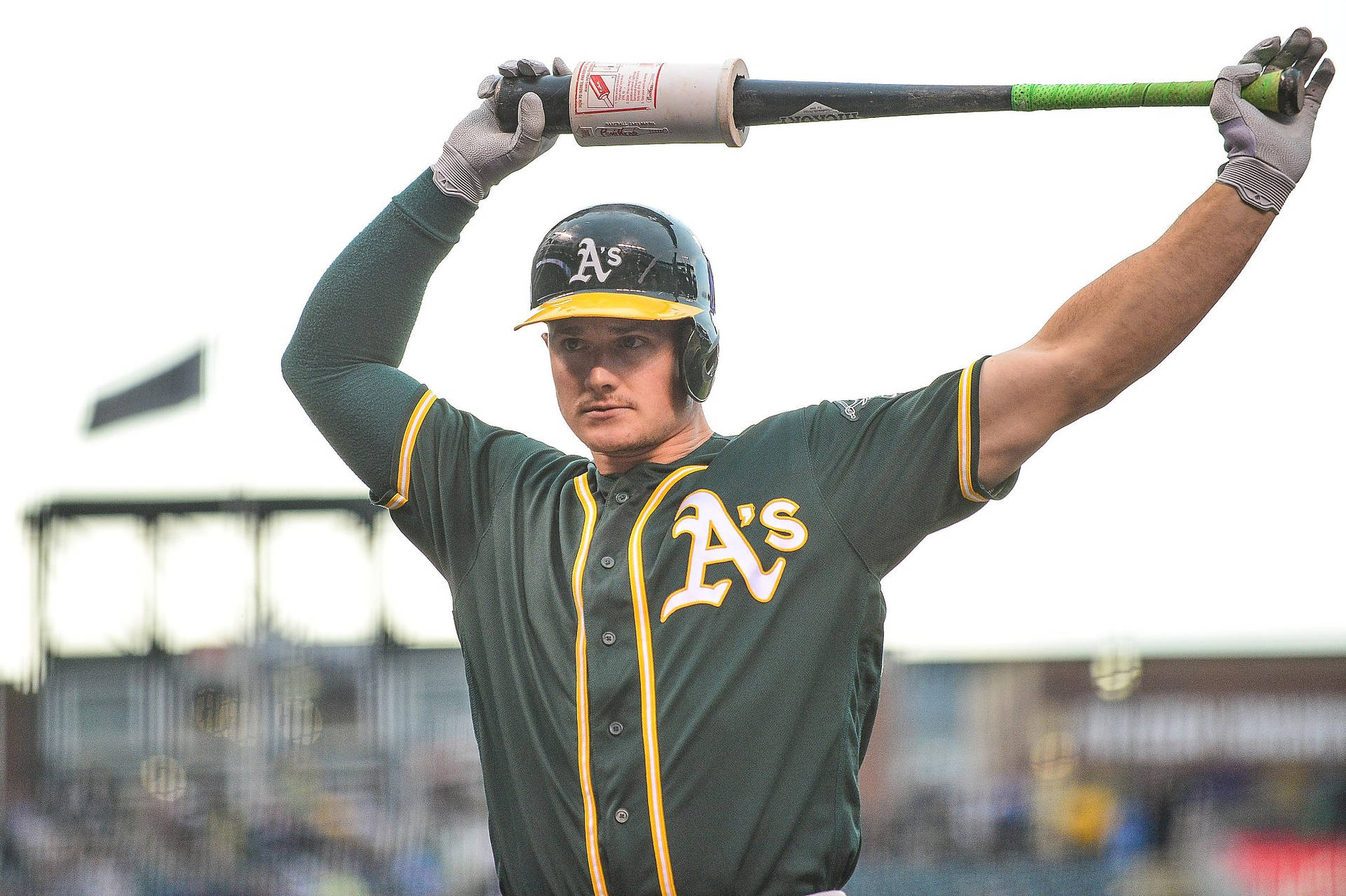 Matt Chapman Lifting Baseball Bat Overhead Background