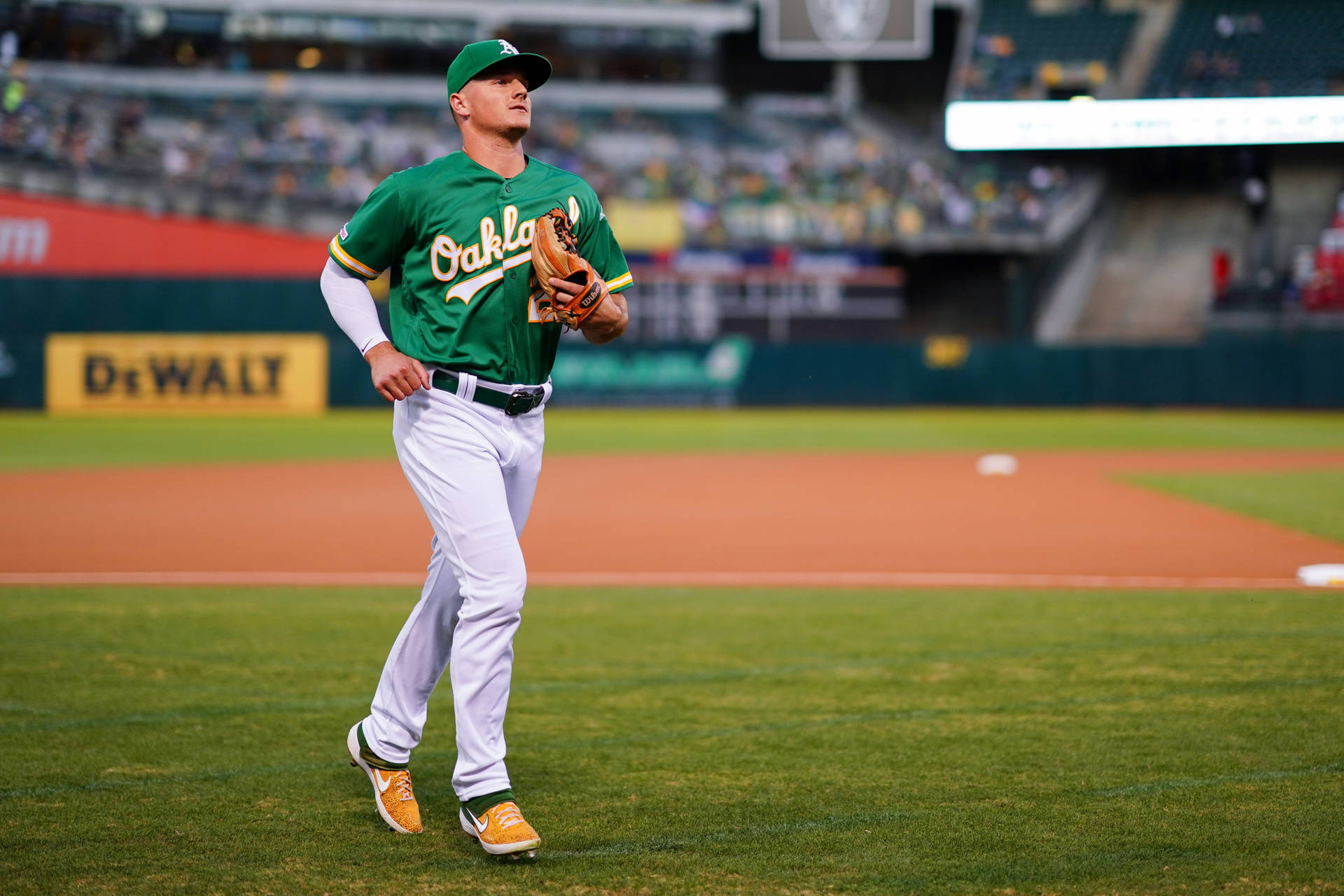 Matt Chapman Running In Baseball Field Background