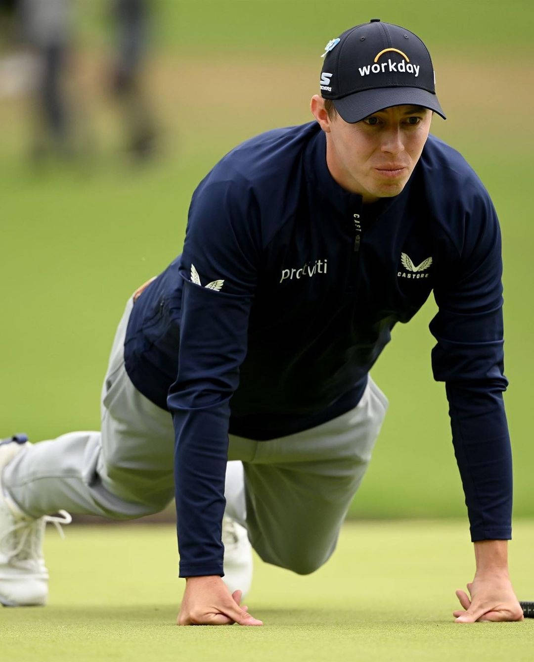 Matt Fitzpatrick Hands On Ground Background