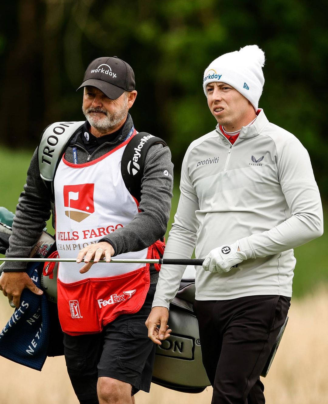 Matt Fitzpatrick With His Caddie Background