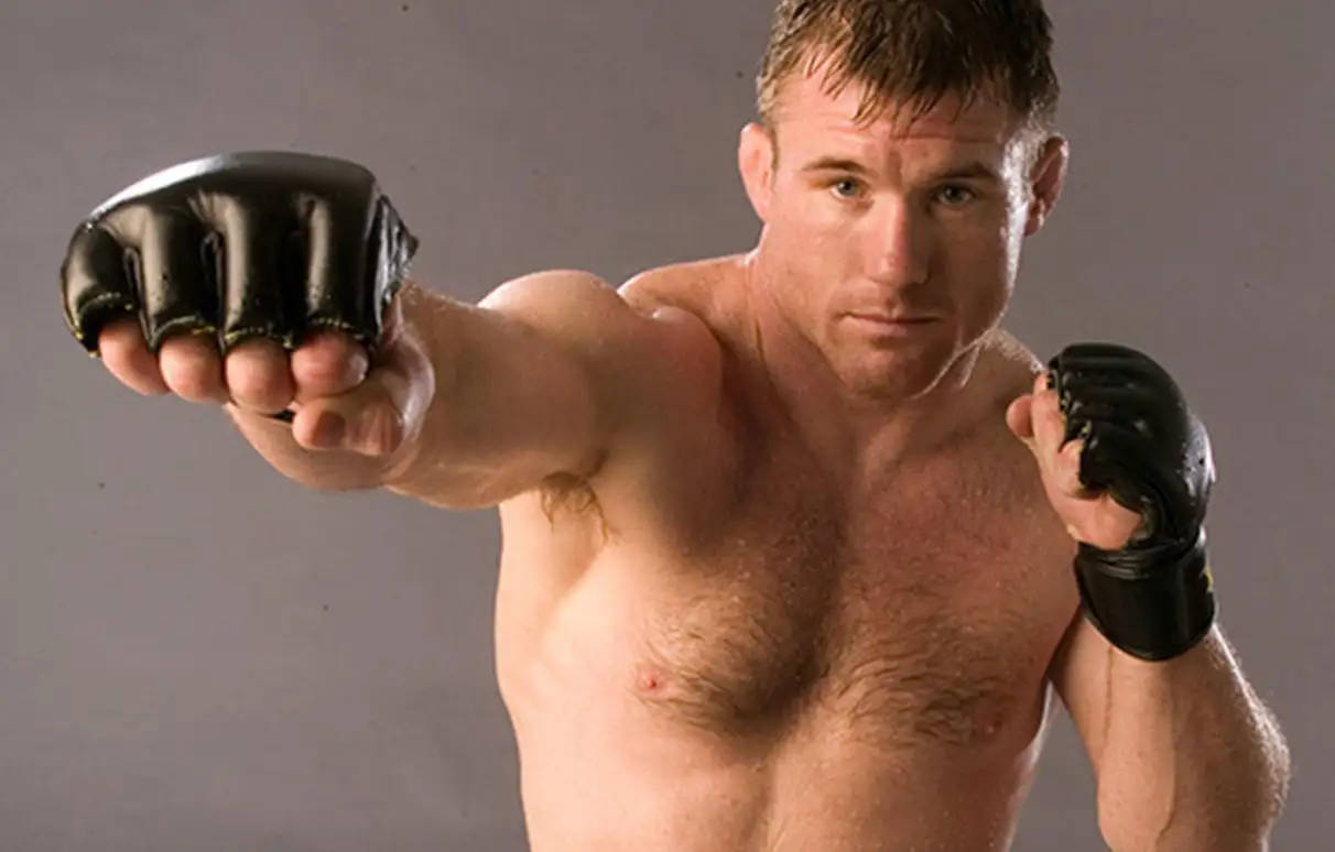 Matt Hughes Posing Punch Background