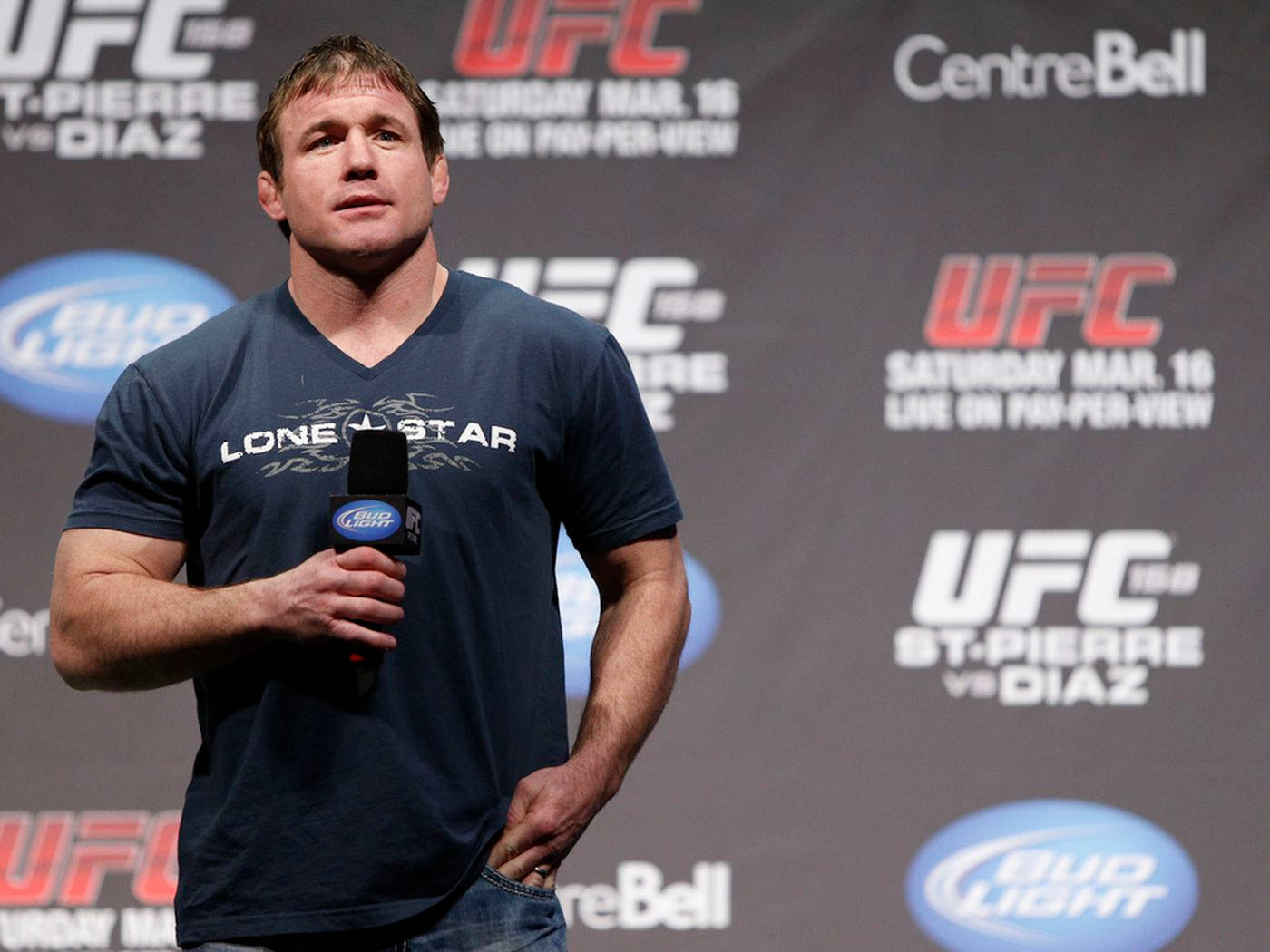 Matt Hughes Speaking At Press Conference Background