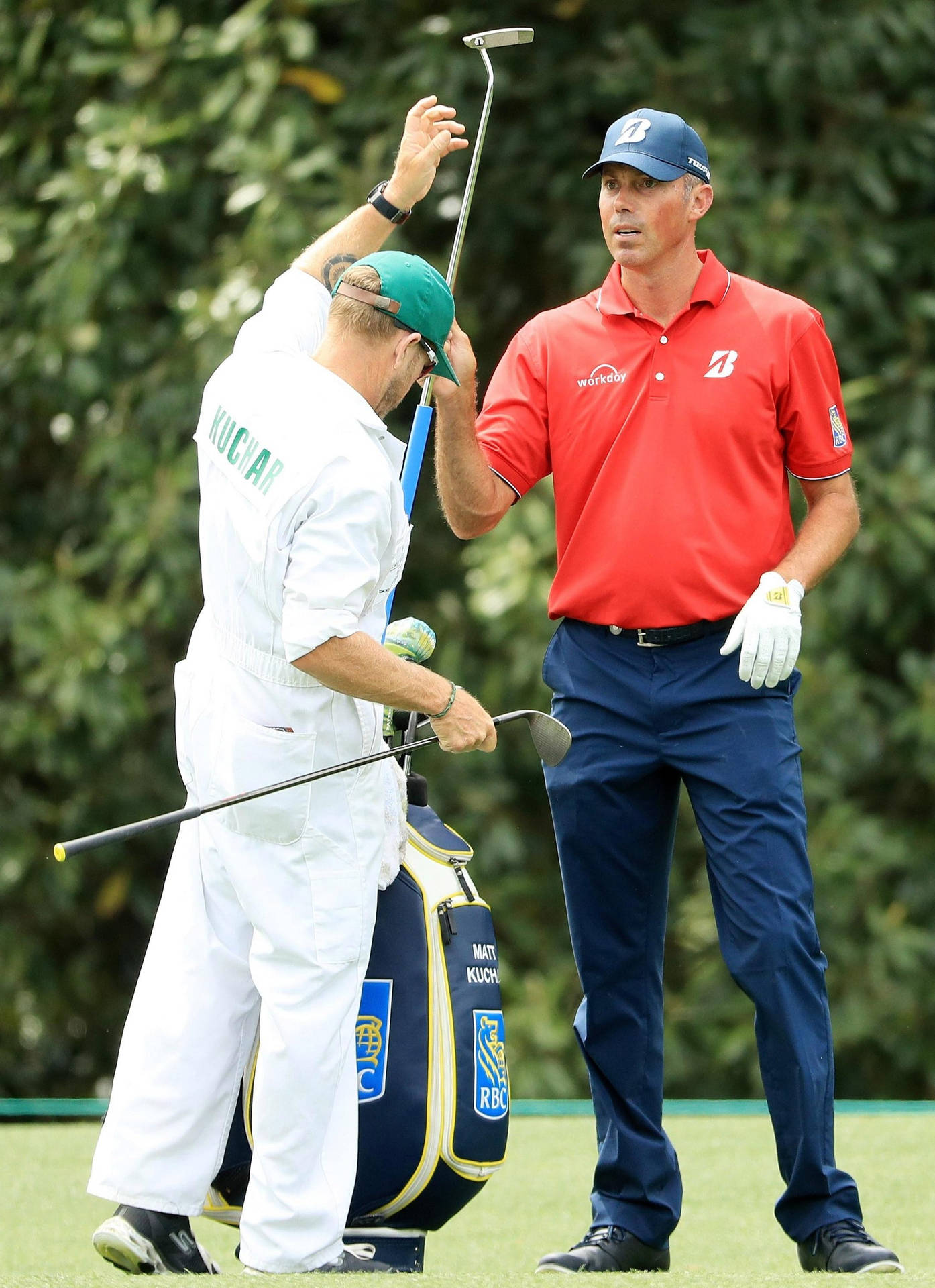 Matt Kuchar Dressed In A Red Shirt On The Golf Course Background