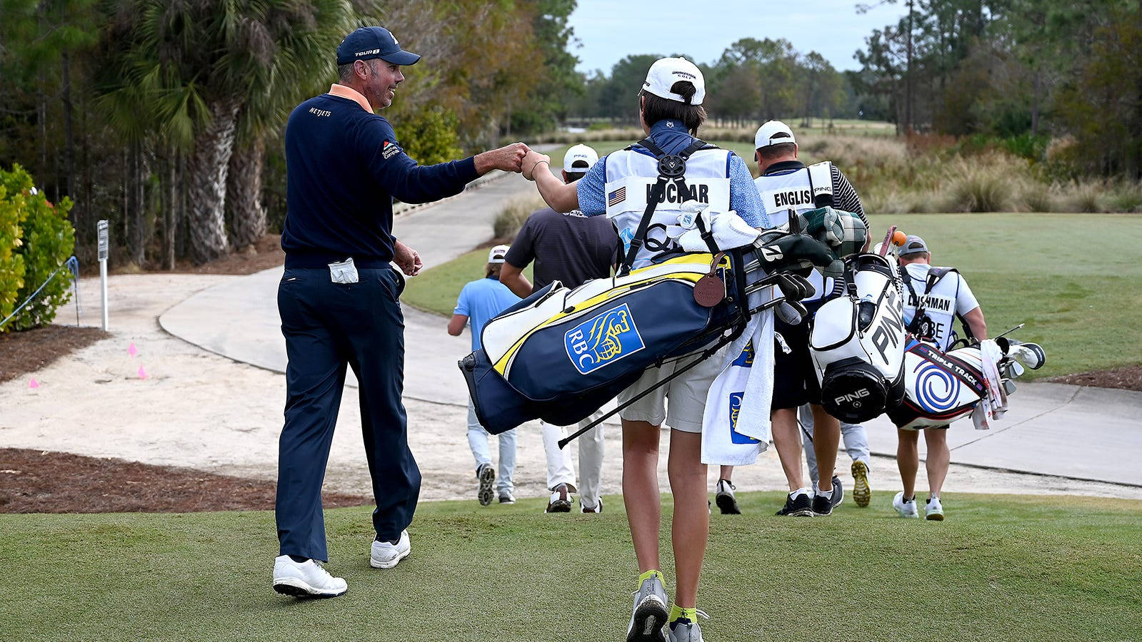 Matt Kuchar Gives Fist Bump Background