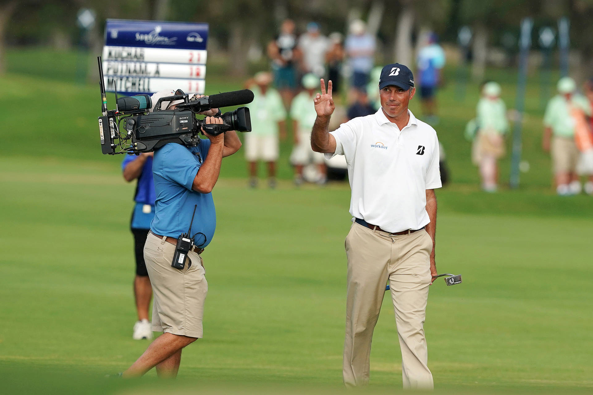 Matt Kuchar Greeting Camera Man Background