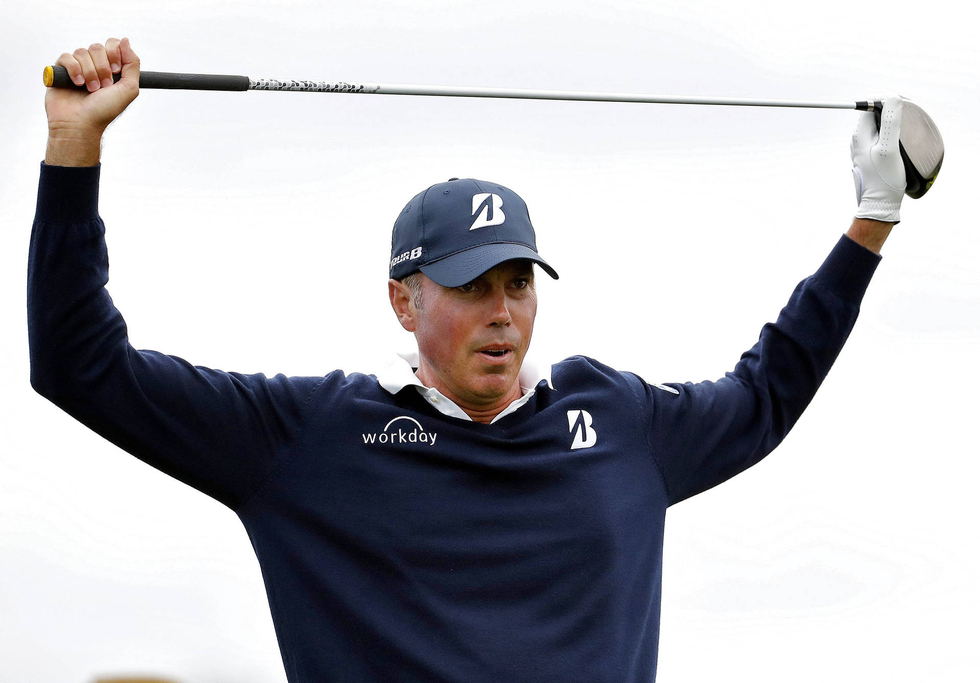 Matt Kuchar Holding Golf Club Background