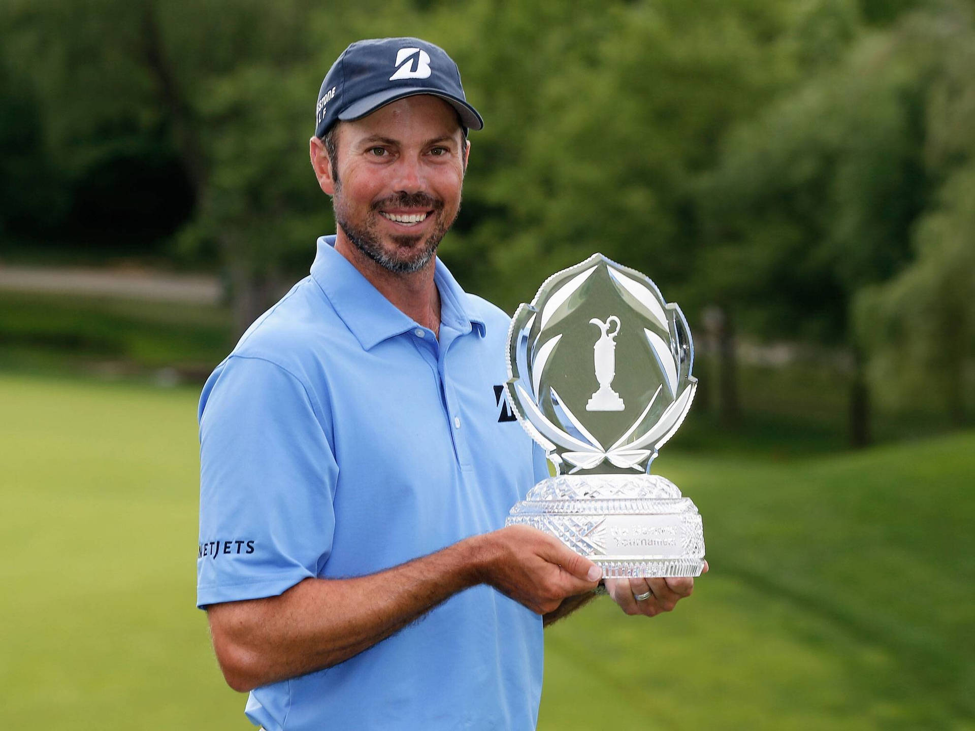 Matt Kuchar Proud Of Trophy Background