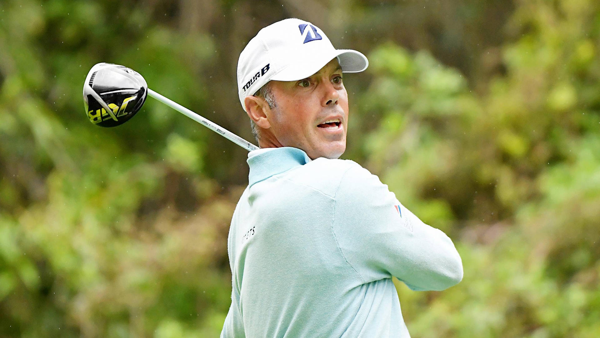 Matt Kuchar Swinging Golf Club Background