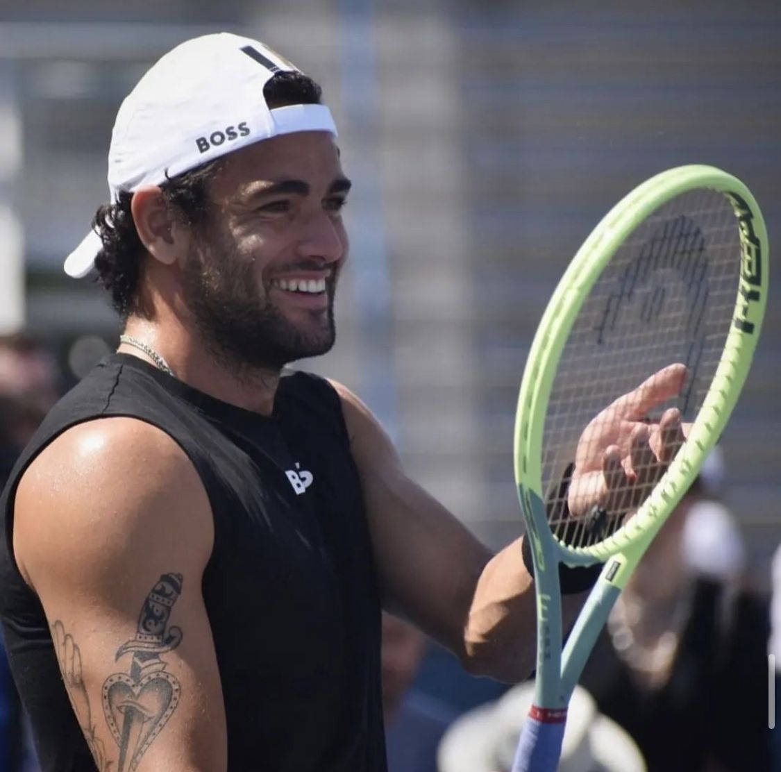 Matteo Berrettini With Huge Smile Background