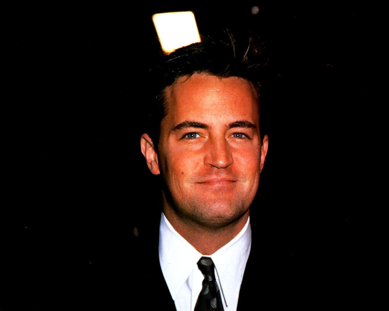 Matthew Perry In A Candid Moment. Background