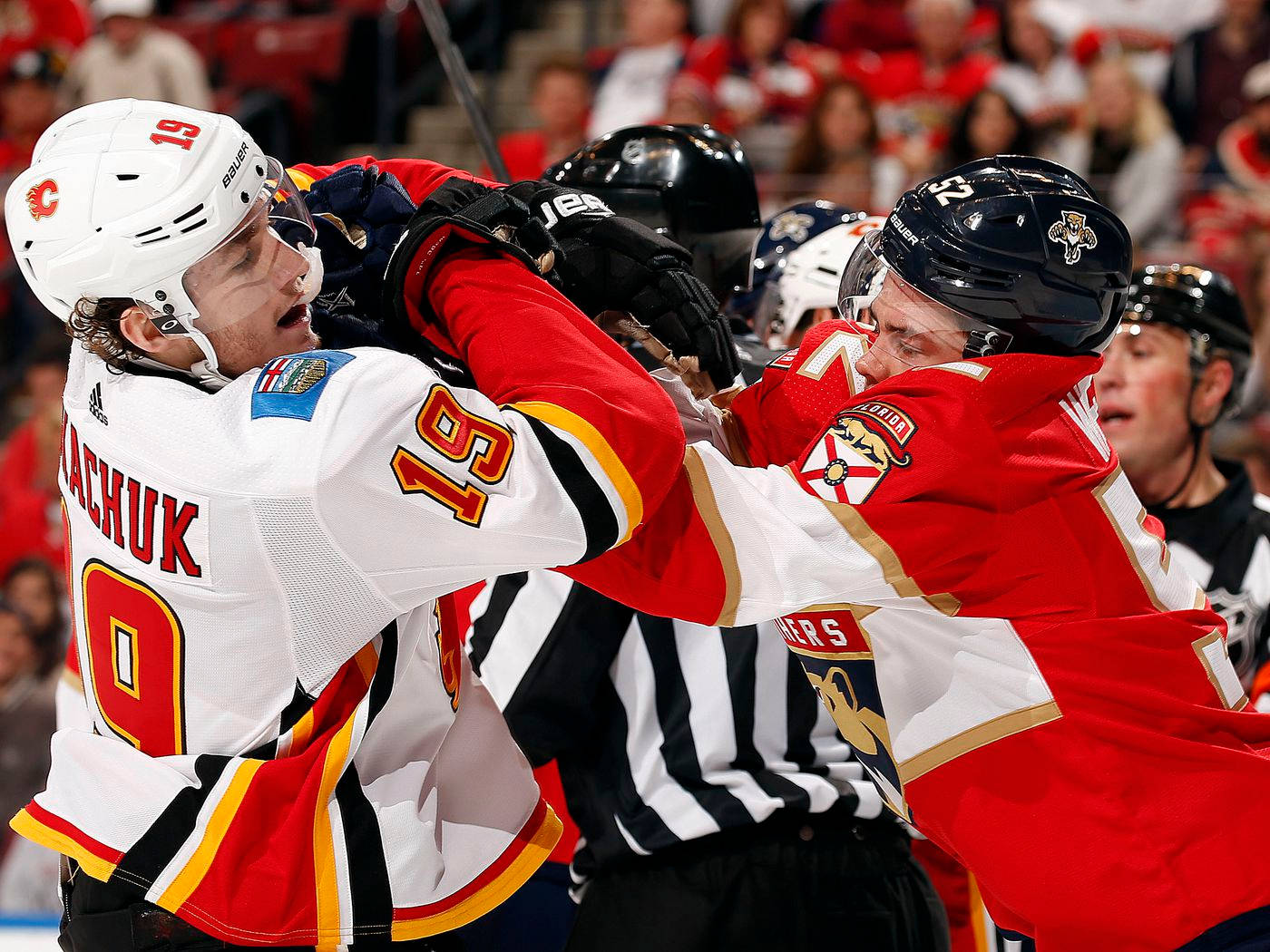 Matthew Tkachuk In Action During A Hockey Game.