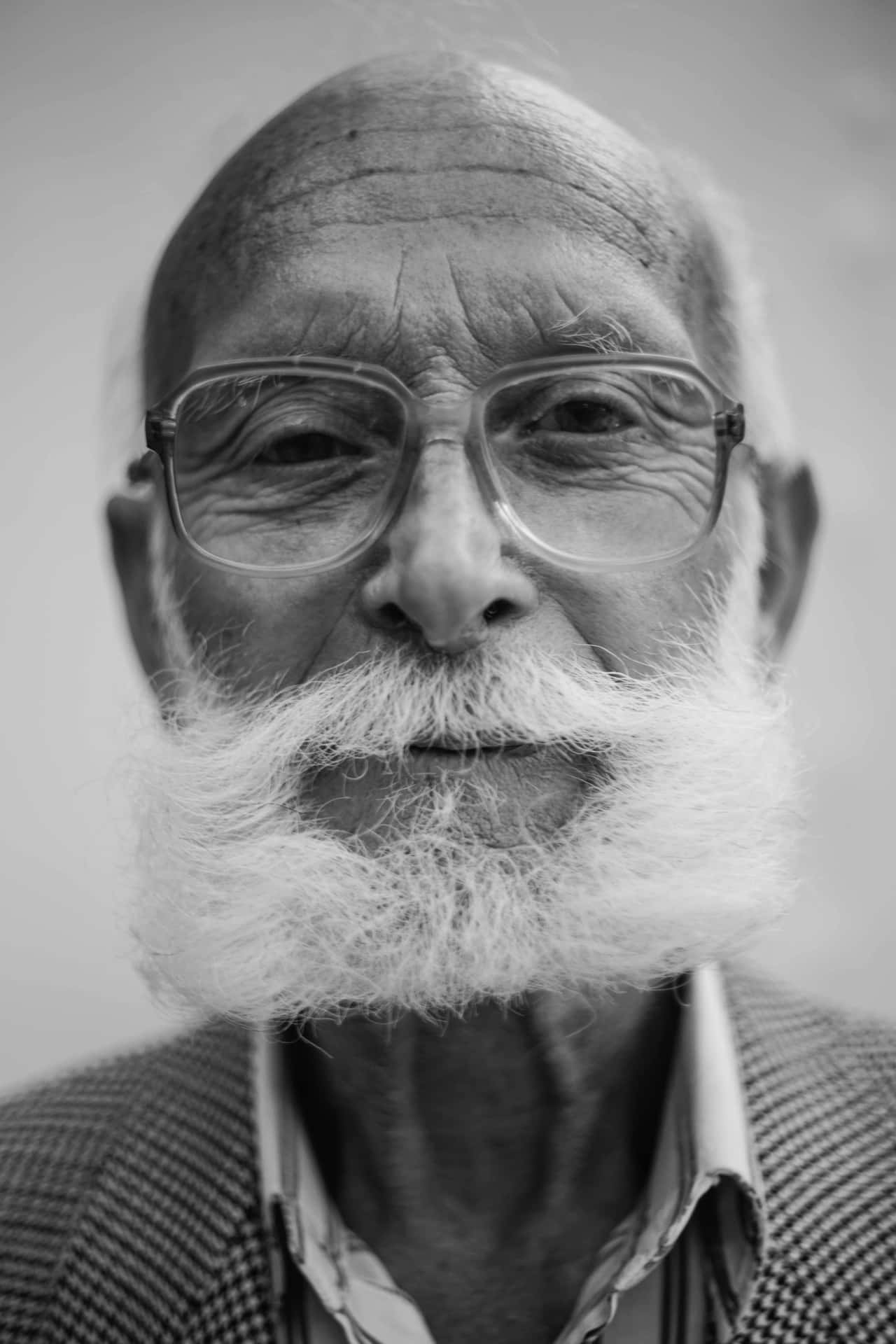 Mature Man With Boxed Beard Background